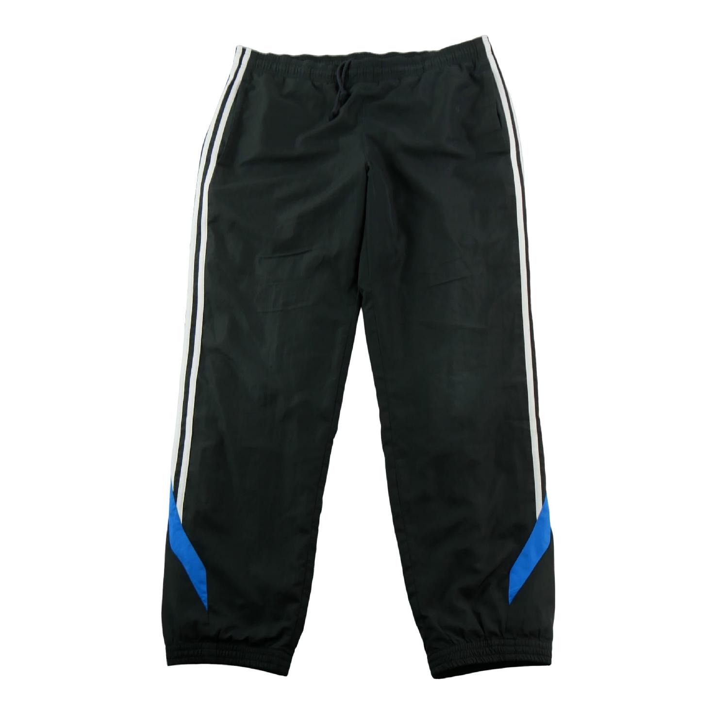 Adidas Jogging 3 bandes latérales blanches Chevilles élastiquées Polyester Homme Taille 2XL Très bon état Adidas reconditionné disponible sur Sporteed