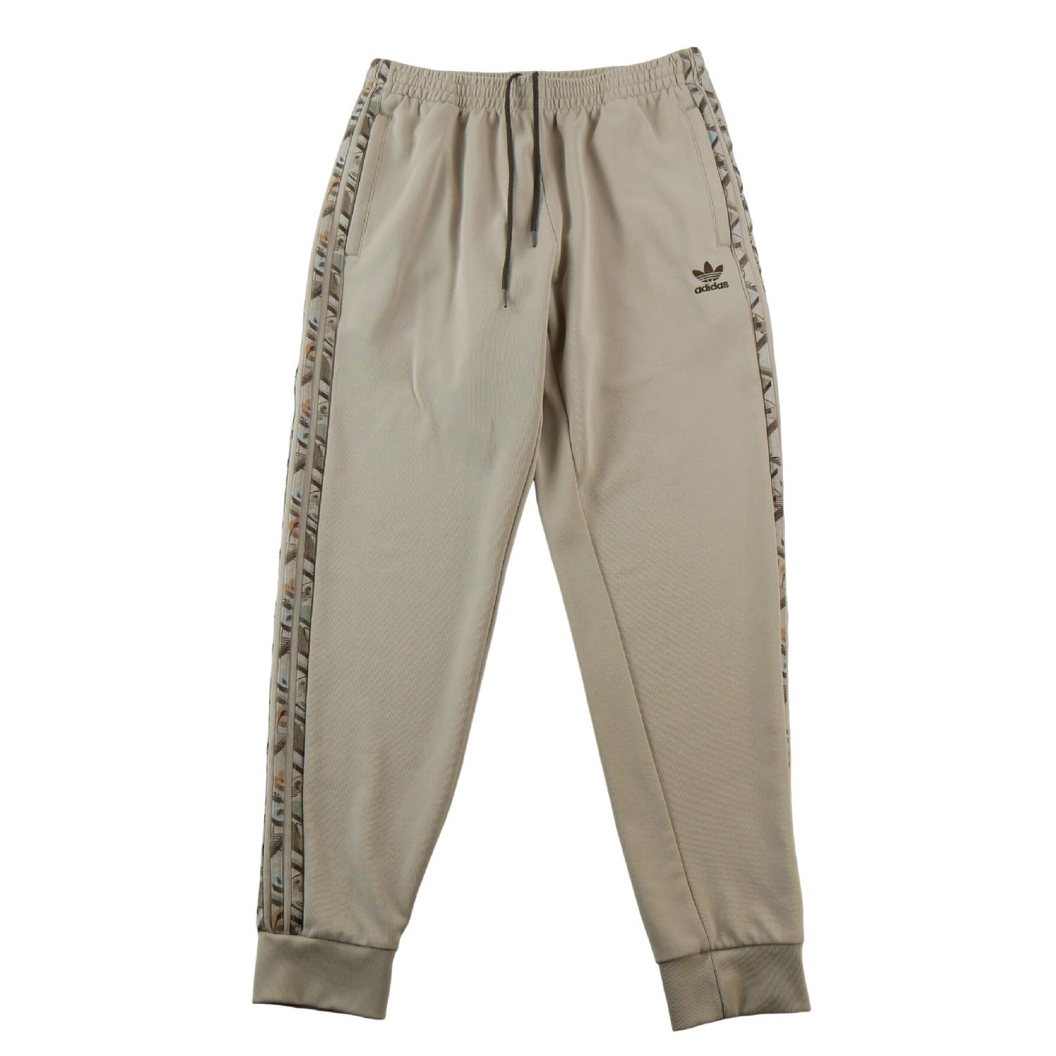 Adidas Jogging Monogram All Over Print Regular Track Pants Trefoil brodé Homme Taille L Très bon état Adidas reconditionné disponible sur Sporteed