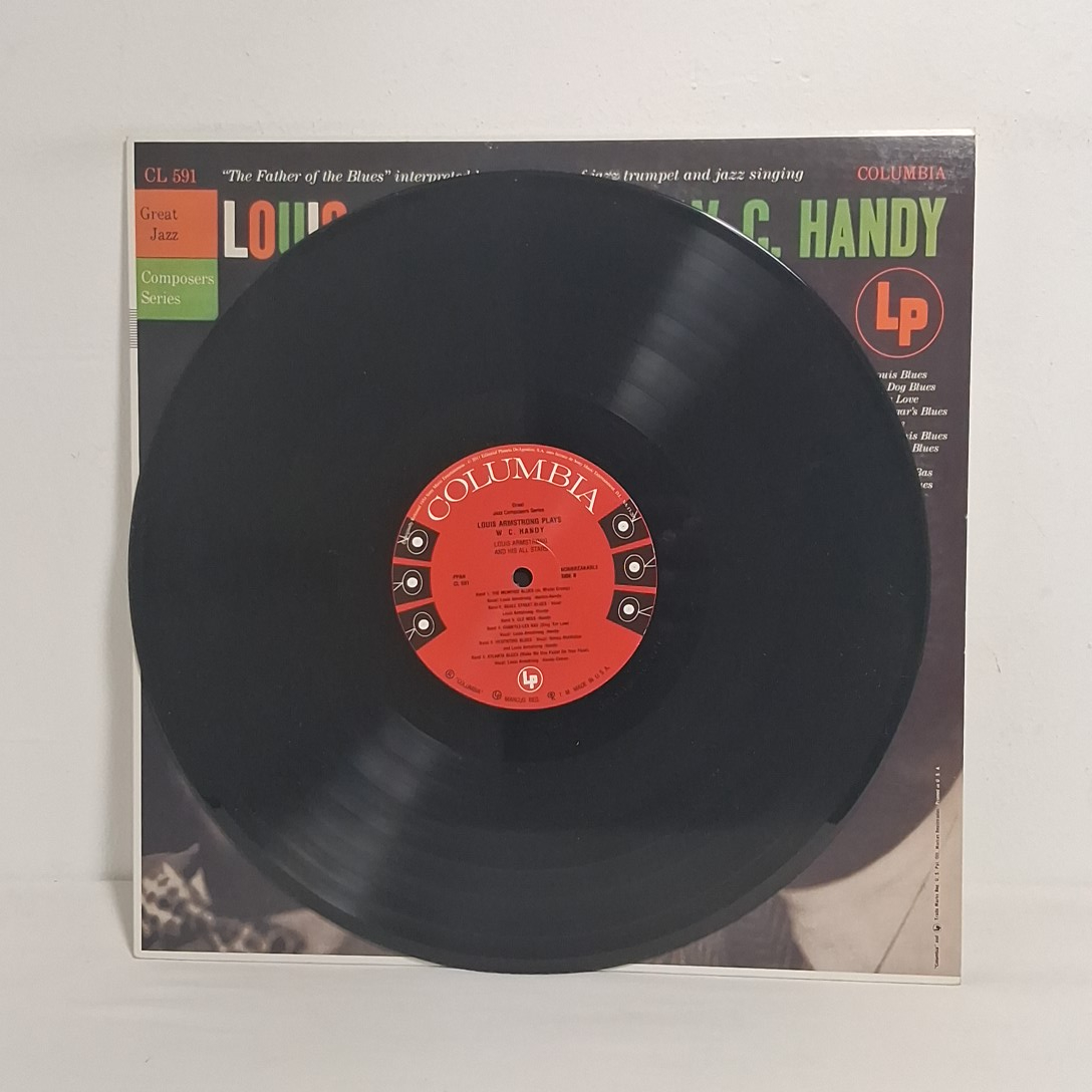 Voir photo 2 de Album Louis Armstrong plays W.C Handy en vinyle 33t réédition Album Louis Armstrong plays W.C Handy en vinyle 33t réédition État correct reconditionné photo 2