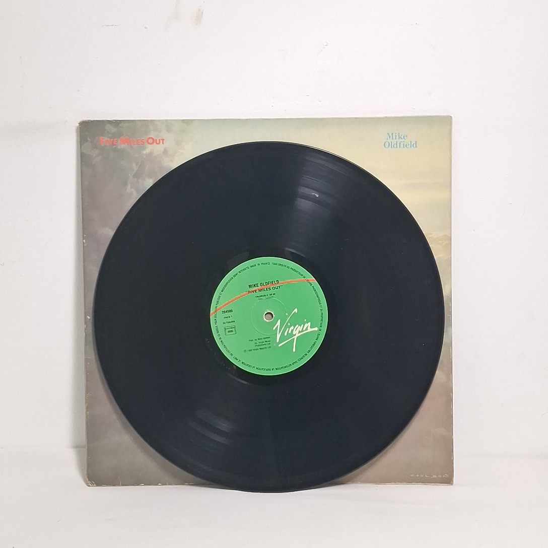 Voir photo 2 de Album Mike Oldfield " five miles out " en vinyle 33t Album Mike Oldfield " five miles out " en vinyle 33t État correct reconditionné photo 2