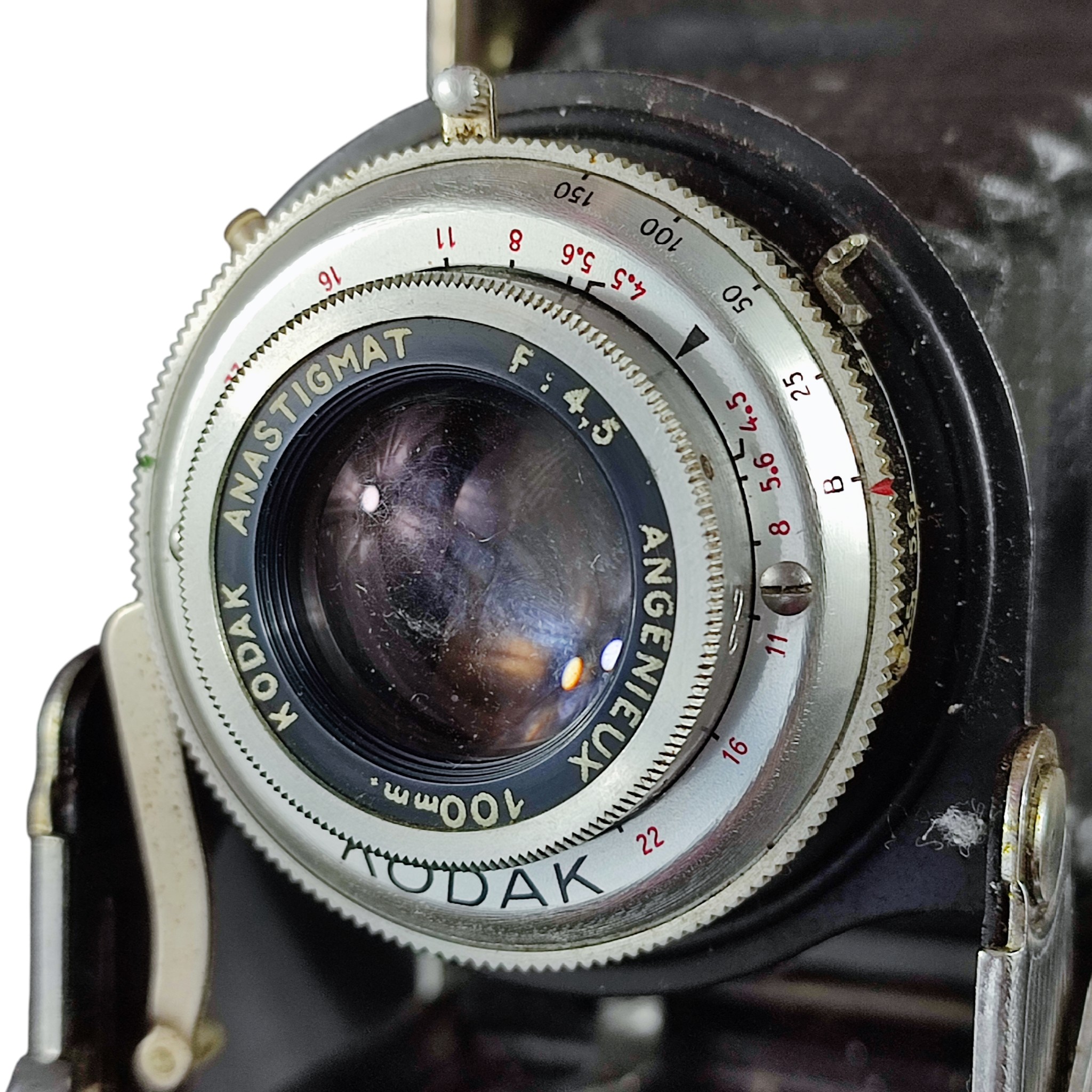 Voir photo 11 de Ancien appareil photo argentique à soufflet KODAK B31 avec objectif Anastigmat F/4.5 Angenieux 100 mm Ancien appareil photo argentique à soufflet KODAK B31 avec objectif Anastigmat F/4.5 Angenieux 100 mm reconditionné photo 11