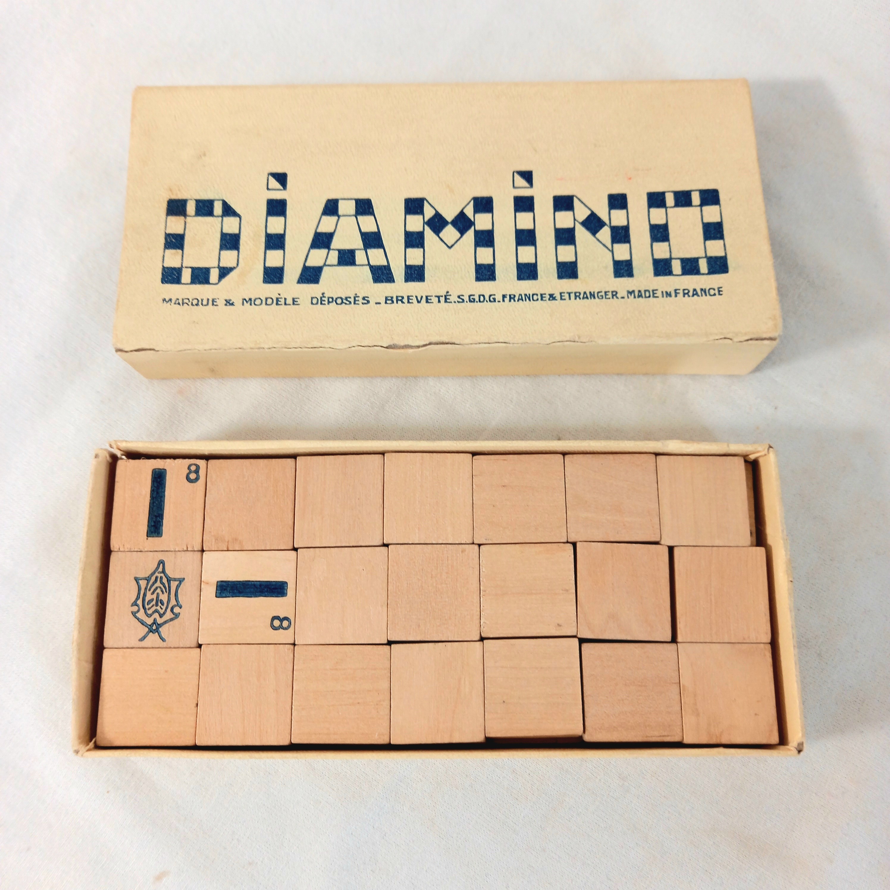 Voir photo 3 de Ancien jeu de société Diamino (en bois), de marque Standard, breveté S.G.D.G. (avant 1968) Ancien jeu de société Diamino (en bois), de marque Standard, breveté S.G.D.G. (avant 1968) État correct reconditionné photo 3