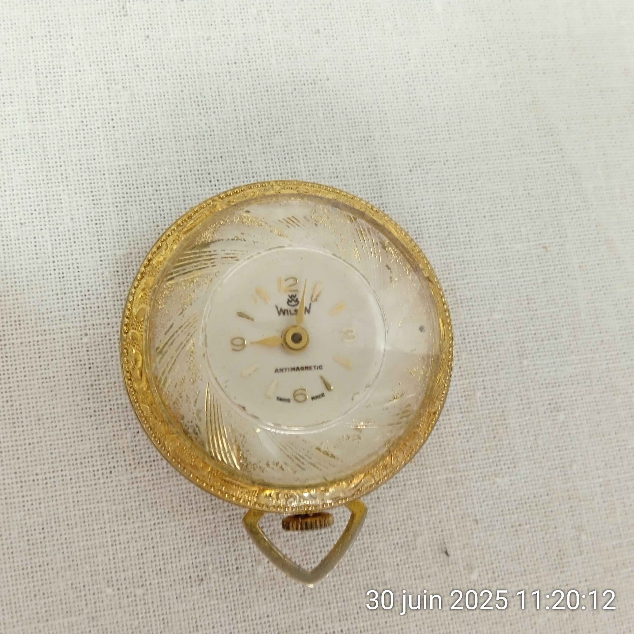 Voir photo 3 de Ancien montre pendentif mécanique WILSON pour femme Ancien montre pendentif mécanique WILSON pour femme Bon état reconditionné photo 3