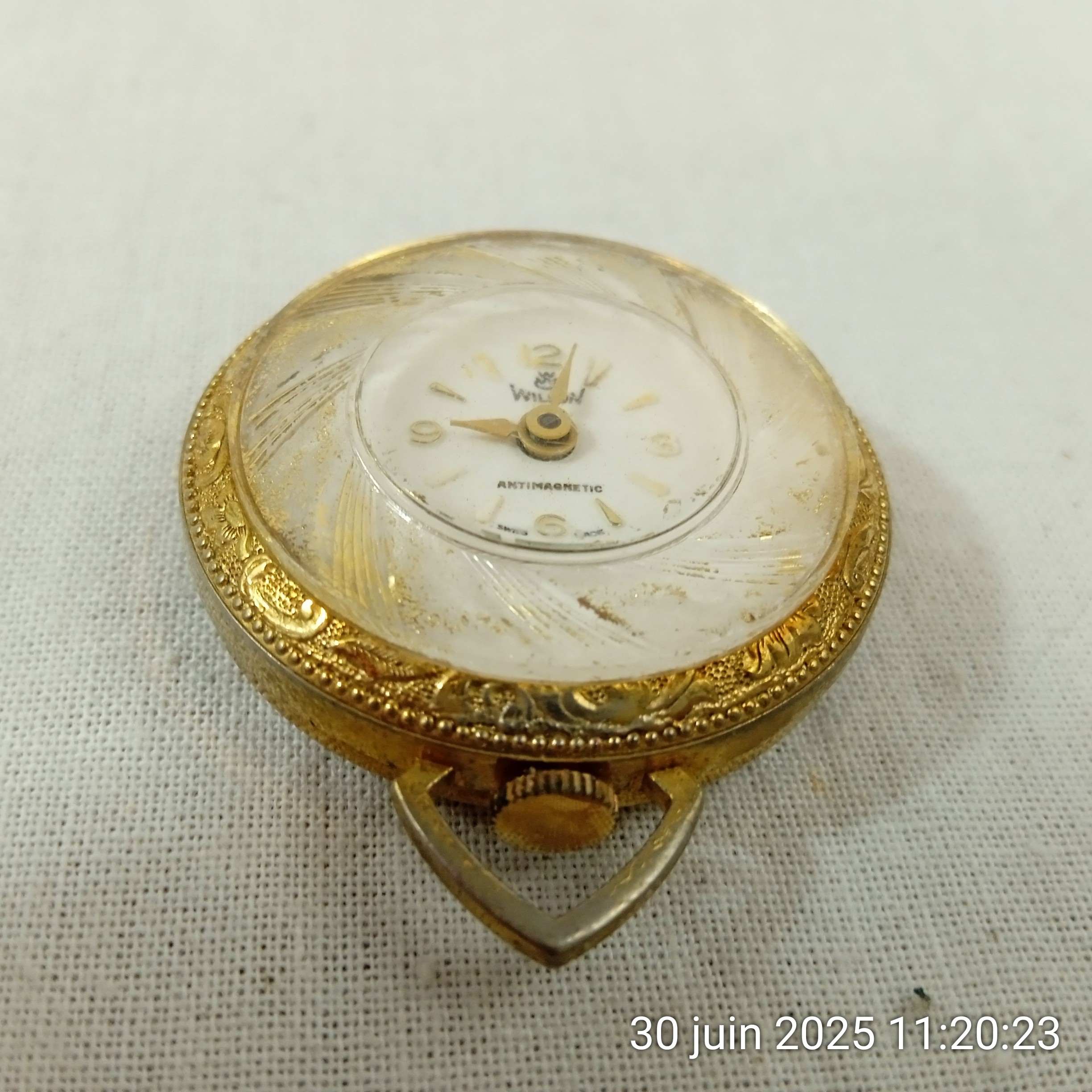 Voir photo 4 de Ancien montre pendentif mécanique WILSON pour femme Ancien montre pendentif mécanique WILSON pour femme Bon état reconditionné photo 4