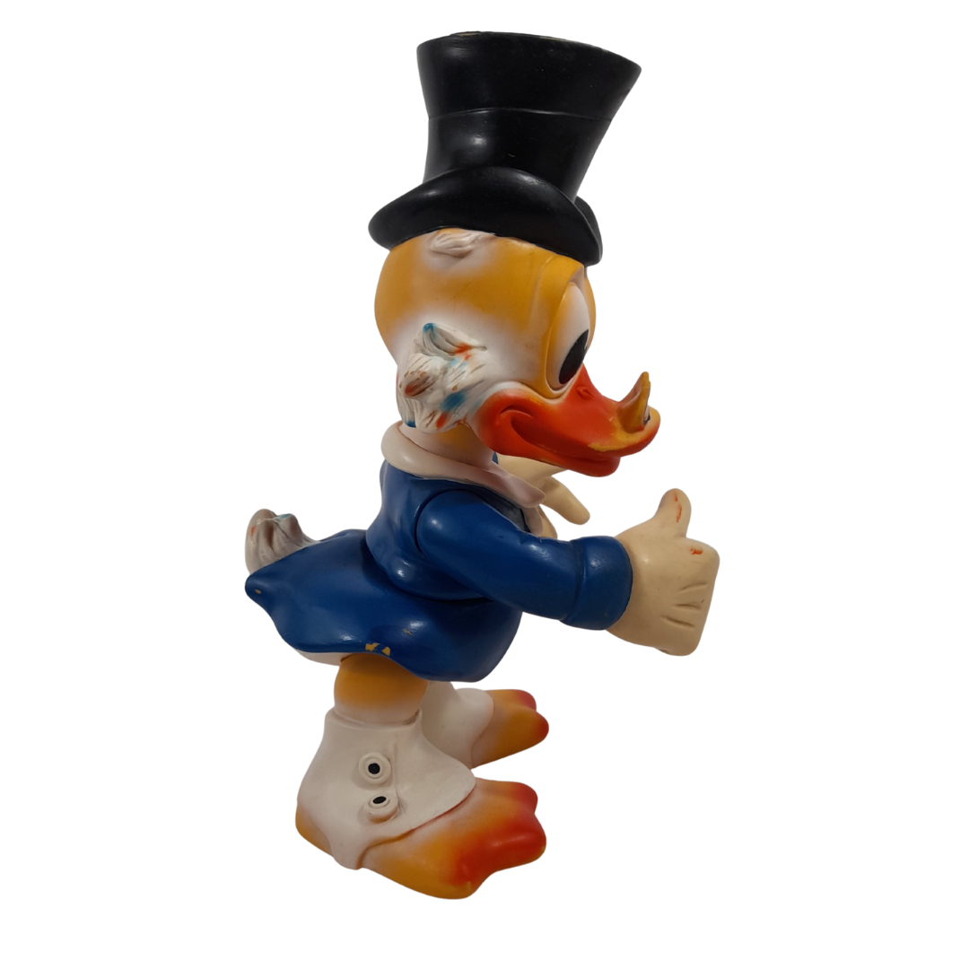 Voir photo 3 de Ancienne grande figurine pouët Picsou 38 cm – Ledraplastic – Années 60/70 Ancienne grande figurine pouët Picsou 38 cm – Ledraplastic – Années 60/70 Bon état reconditionné photo 3