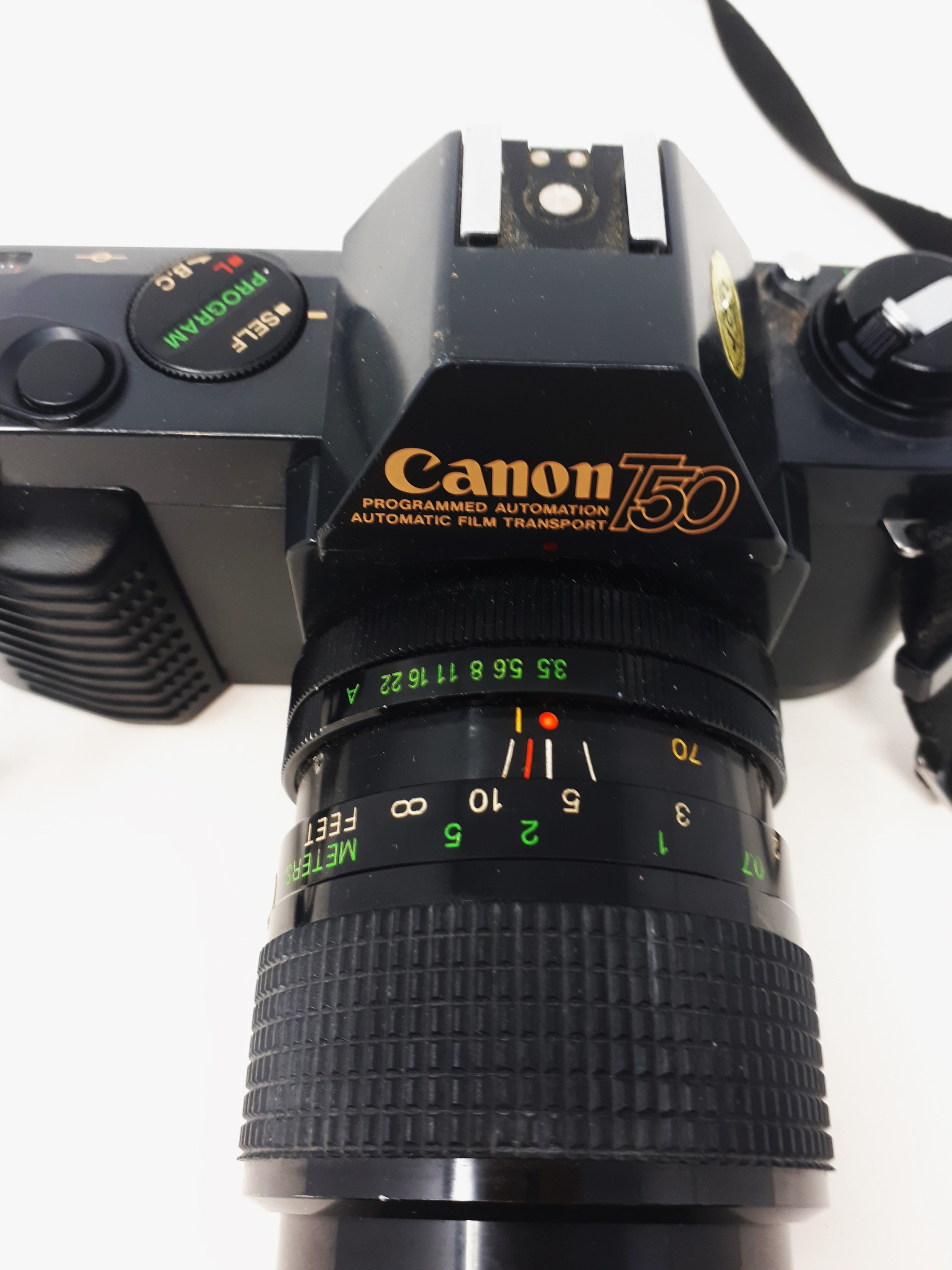 Voir photo 2 de Appareil photo argentique canon t50+objectif zoom 35-70 mm Appareil photo argentique canon t50+objectif zoom 35-70 mm état correct reconditionné photo 2