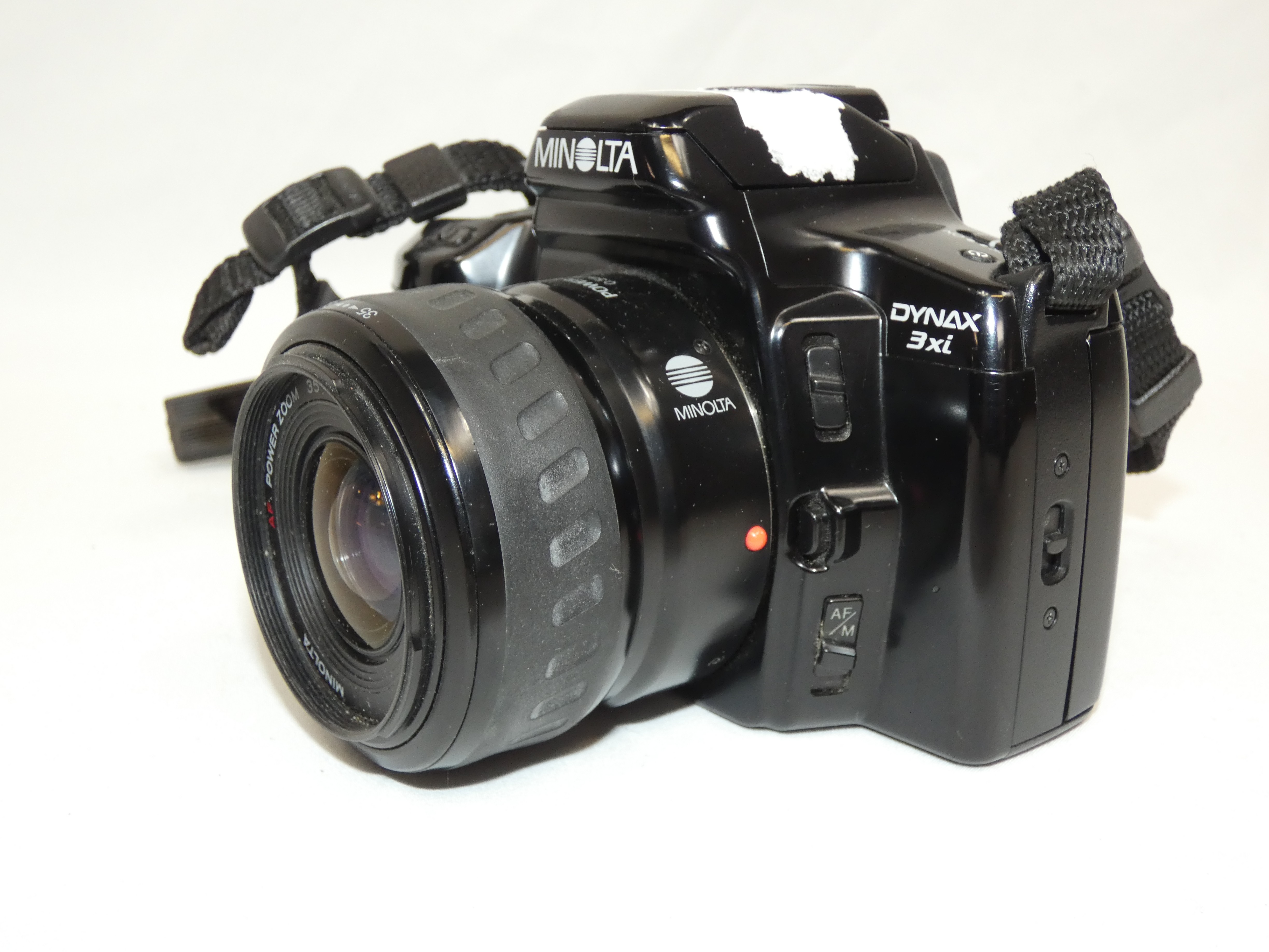 Voir photo 2 de Appareil photo argentique MINOLTA Dynax 3xi avec objectif Minolta AF 35-80 mm 1:4(22)-5.6 (Non testé) Appareil photo argentique MINOLTA Dynax 3xi avec objectif Minolta AF 35-80 mm 1:4(22)-5.6 (Non testé) Bon état reconditionné photo 2