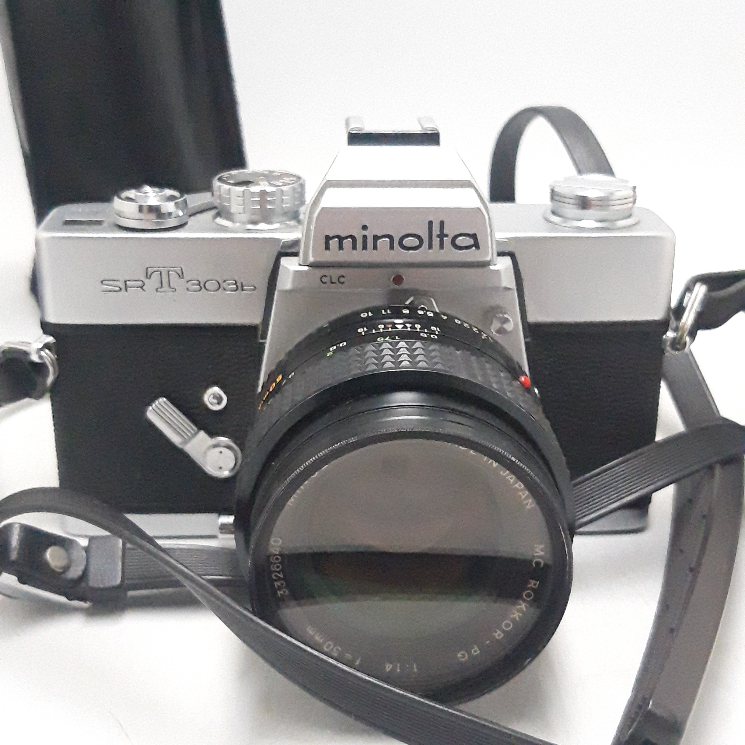 Voir photo 2 de Appareil photo argentique Minolta SR-T 303b vintage + 2 objectifs + sacoche Appareil photo argentique Minolta SR-T 303b vintage + 2 objectifs + sacoche Bon état reconditionné photo 2