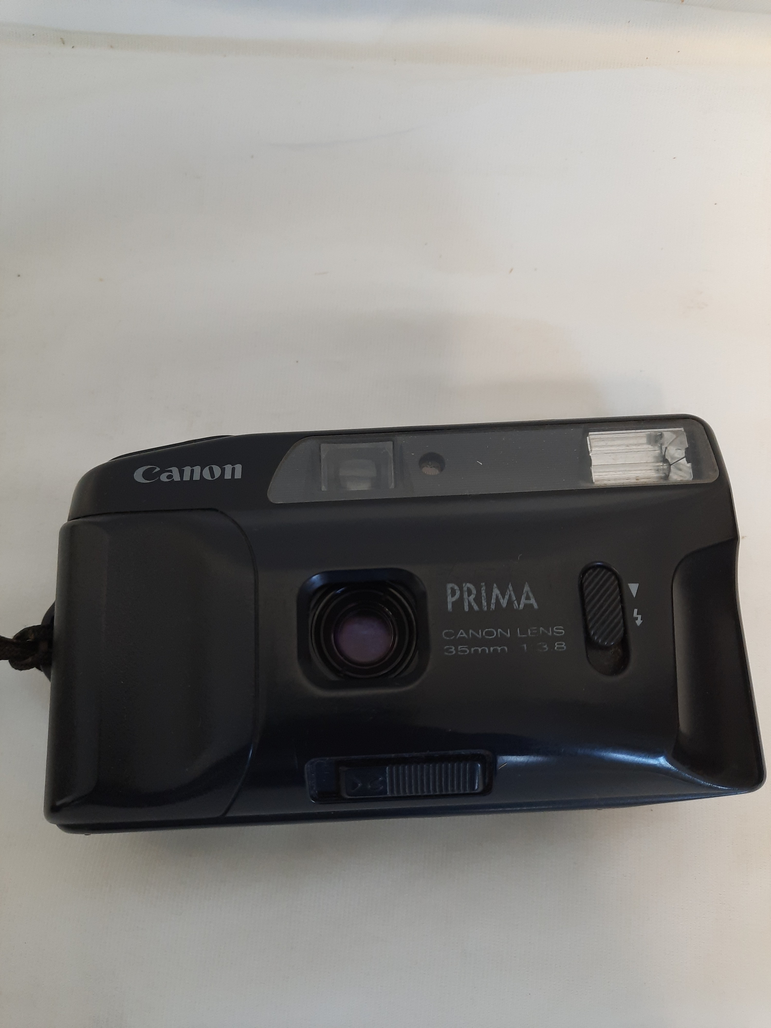 Voir photo 2 de Appareil photo Canon Prima Junior Appareil photo Canon Prima Junior état correct reconditionné photo 2
