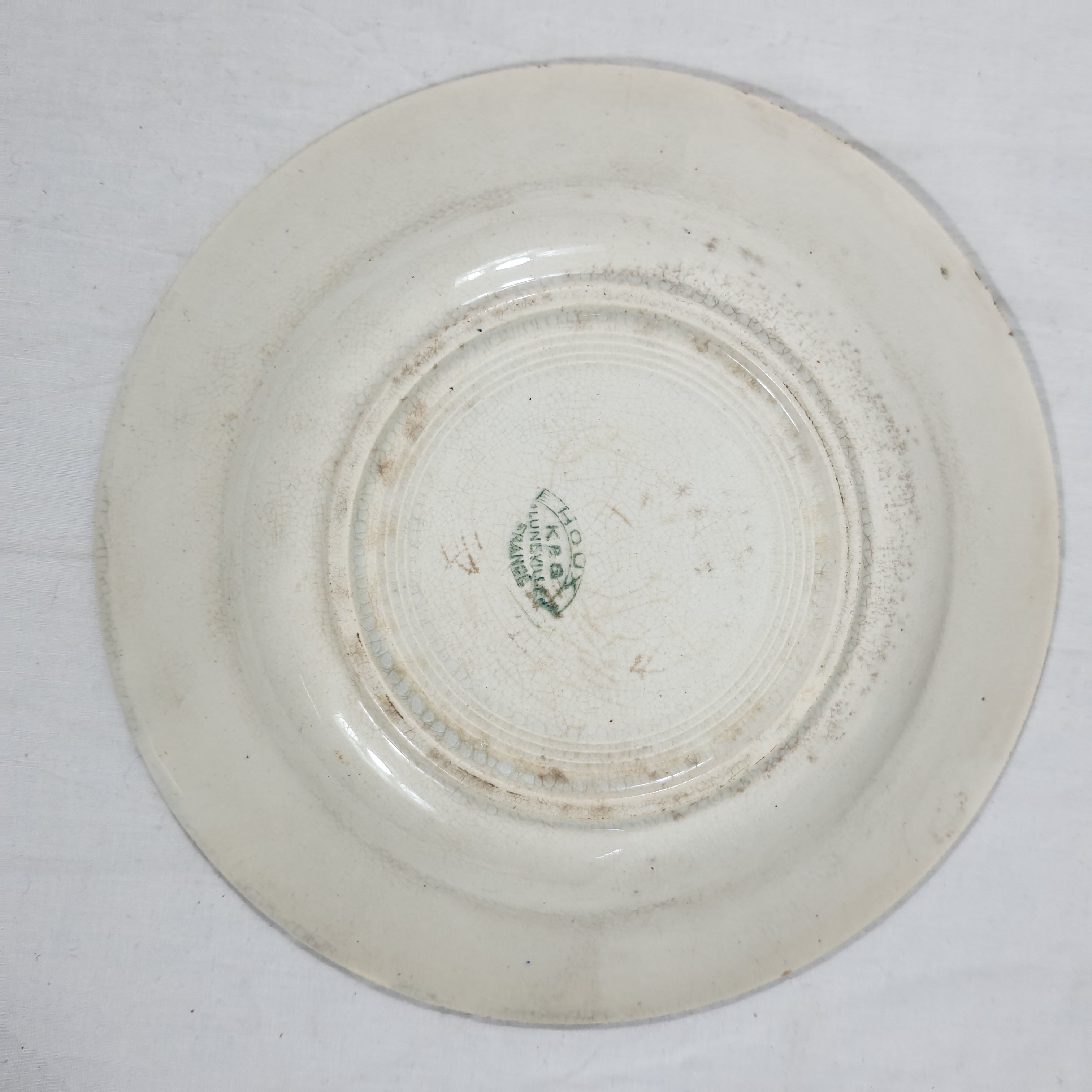 Voir photo 2 de Assiette creuse en faïence de Luneville - Modèle houx Assiette creuse en faïence de Luneville - Modèle houx Bon état reconditionné photo 2