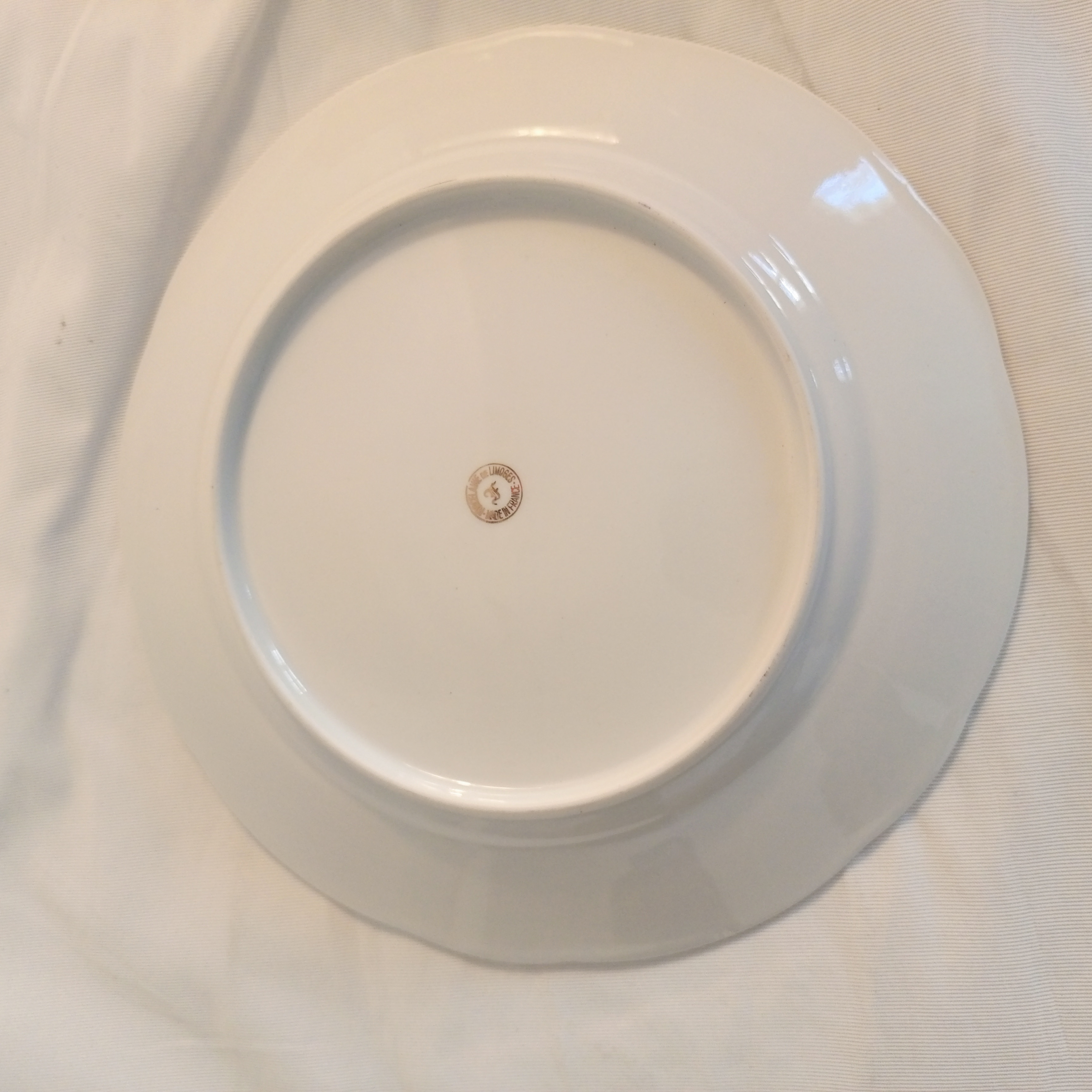 Voir photo 2 de Assiette creuse en porcelaine vintage Assiette creuse en porcelaine vintage État correct reconditionné photo 2