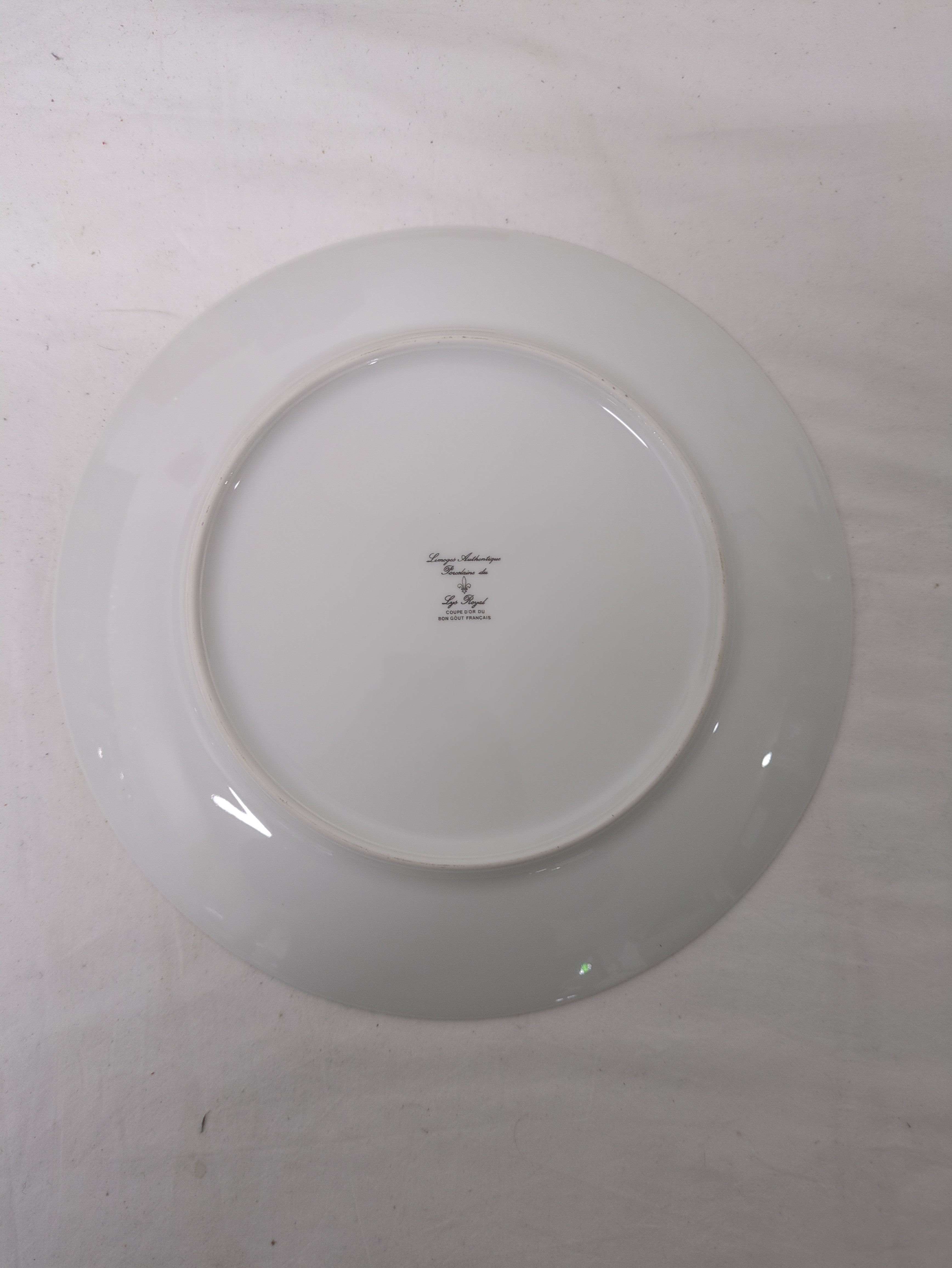 Voir photo 2 de Assiette décorative en porcelaine Assiette décorative en porcelaine Très bon état reconditionné photo 2