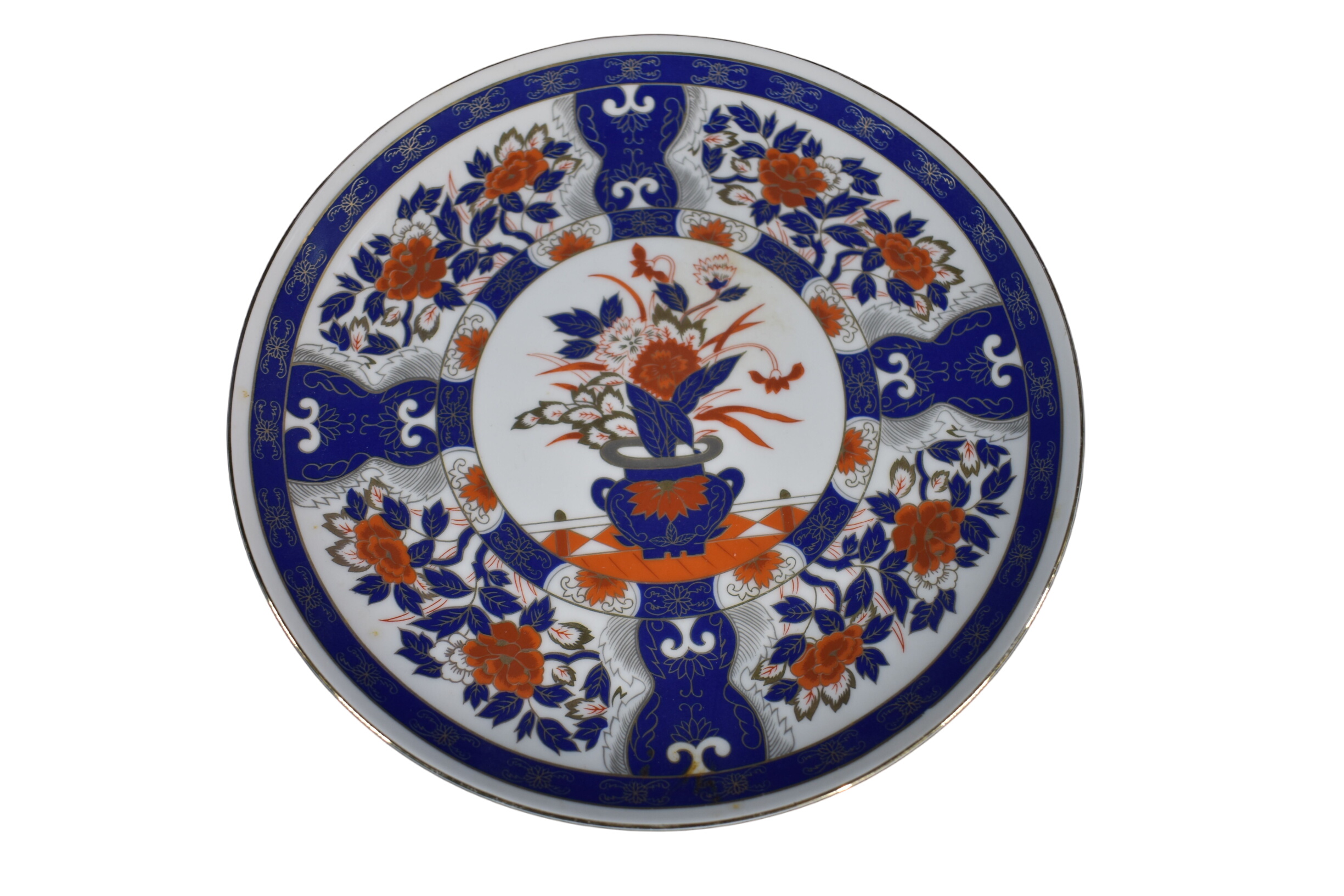 Assiette " Vintage " en porcelaine made in Japan, décor floral bleu, orange et doré, hauteur 3 et diamètre 26.5 cm. Bon état - 31,00 € Assiette " Vintage " en porcelaine made in Japan, décor floral bleu, orange et doré, hauteur 3 et diamètre 26.5 cm. Bon état reconditionné disponible sur Label Emmaüs
