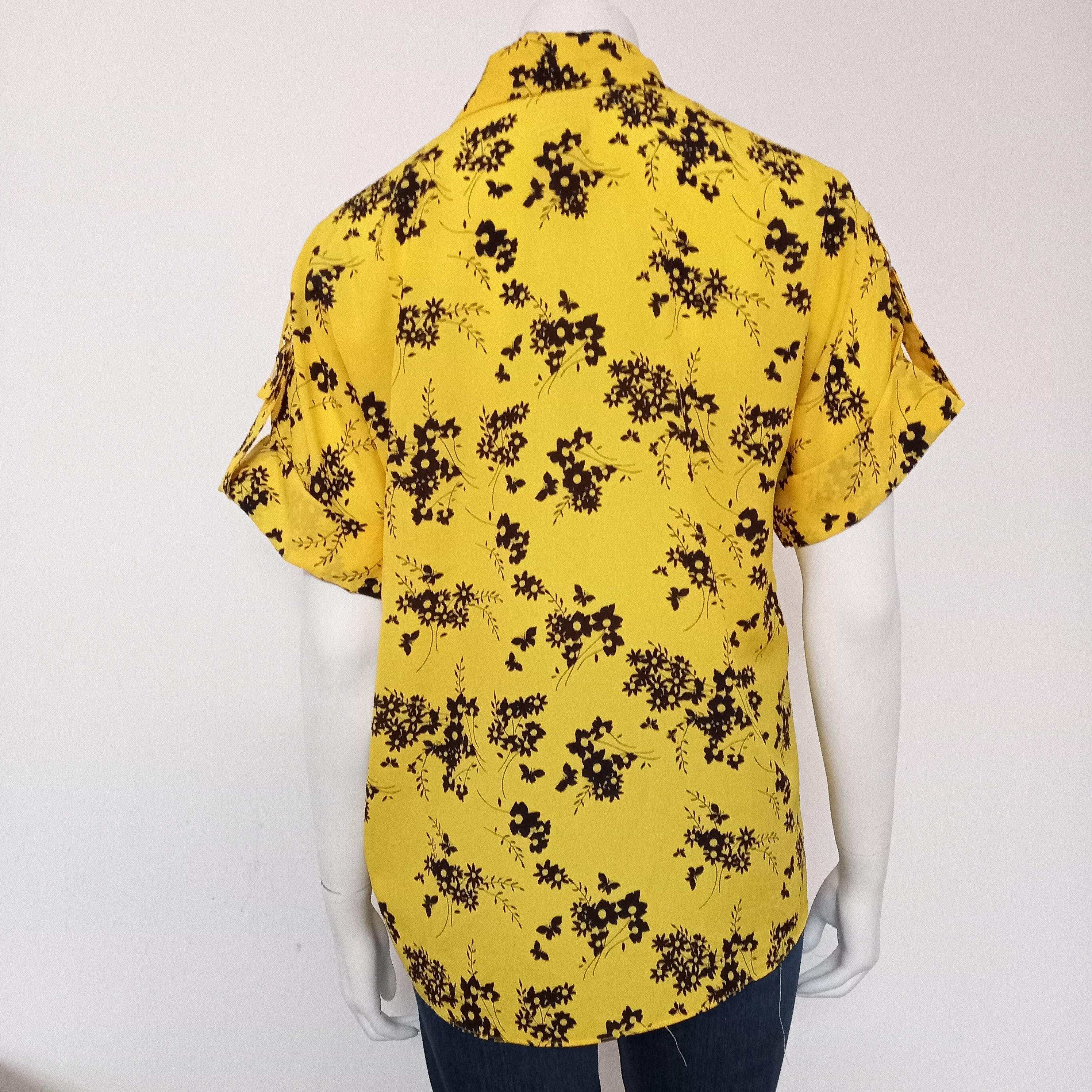 Voir photo 2 de Blouse jaune à motif Michael Kors taille 40/42 Blouse jaune à motif Michael Kors taille 40/42 Très bon état reconditionné photo 2
