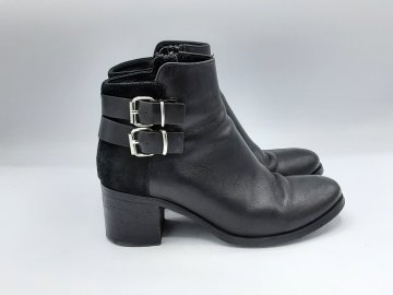 Boots Minelli Noires de seconde main - 25,00 € Boots Minelli Noires de seconde main reconditionné disponible sur Claquettes Market