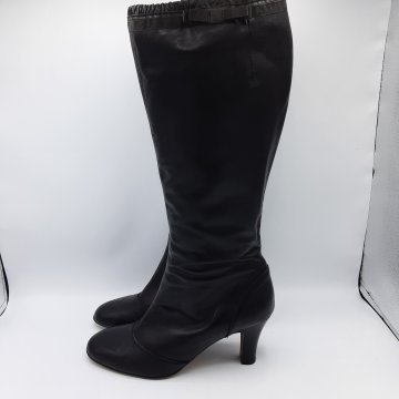 Bottes cuir ANDRÉ de seconde main - 38,00 € Bottes cuir ANDRÉ de seconde main N/A reconditionné disponible sur Claquettes Market