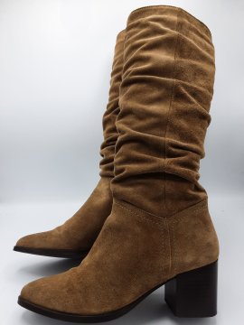 bottes texto beige de seconde main - 60,00 € bottes texto beige de seconde main reconditionné disponible sur Claquettes Market