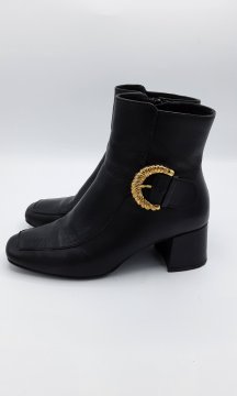 Bottines noires boucle or pointure 36 Très bon état - 35,00 € Bottines noires boucle or pointure 36 Très bon état Mellow Yellow reconditionné disponible sur Claquettes Market
