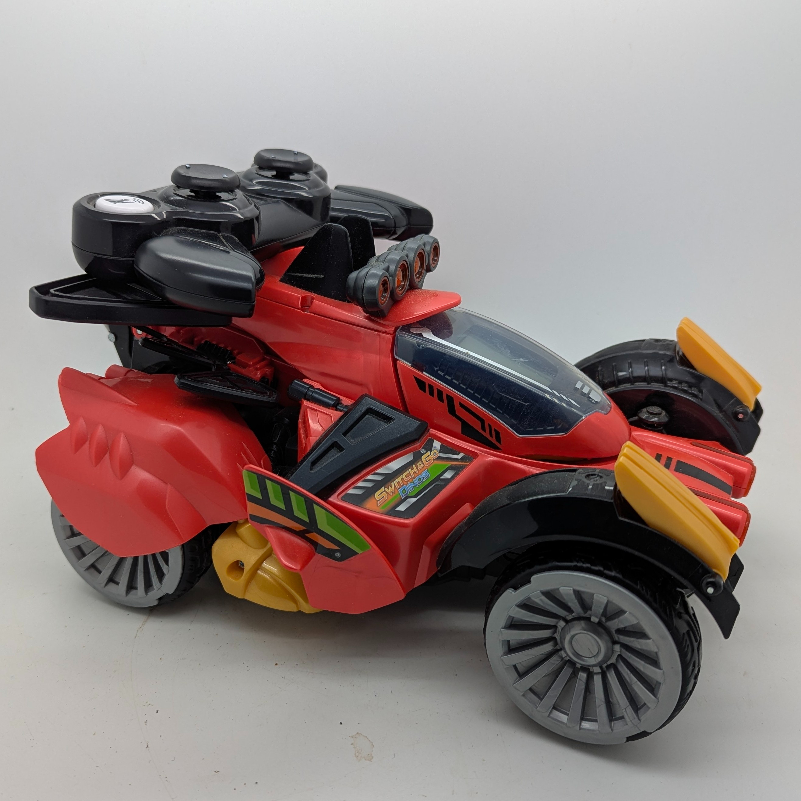Voir photo 3 de Buggy VTECH switch & GO DINOS Robot interactif radiocommandé Braxor le méga Stégosaure transformable en buggy Buggy VTECH switch & GO DINOS Robot interactif radiocommandé Braxor le méga Stégosaure transformable en buggy Très bon état reconditionné photo 3