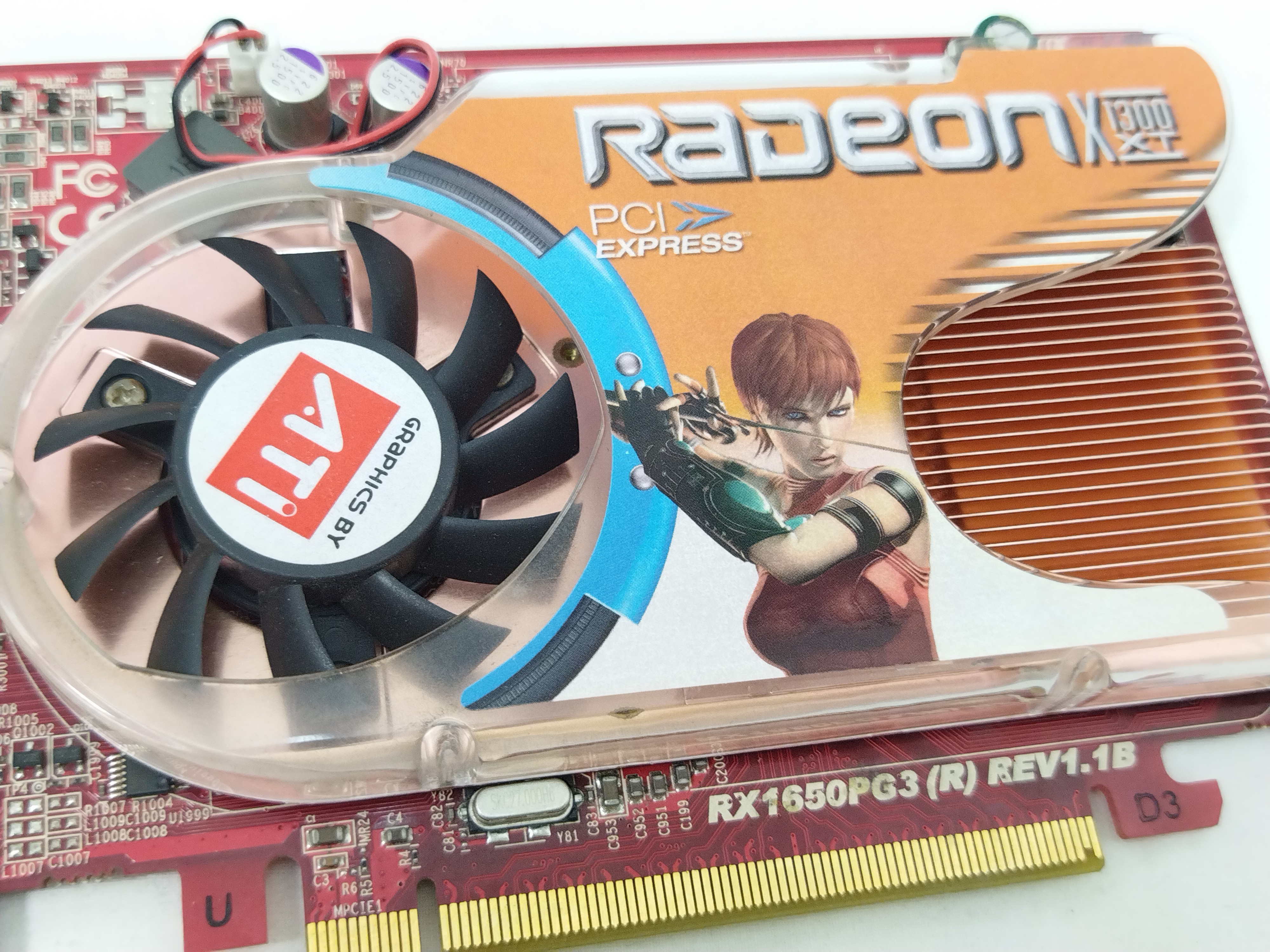 Voir photo 2 de Carte graphique ATI Radeon X1300 - Collector Carte graphique ATI Radeon X1300 - Collector Bon état reconditionné photo 2