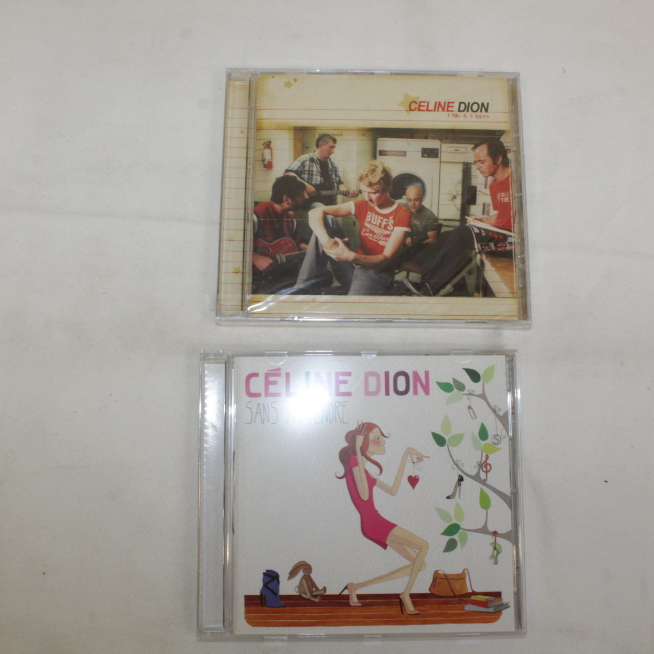 Voir photo 3 de Céline Dion coffret 2 cd's Céline Dion coffret 2 cd's Très bon état reconditionné photo 3