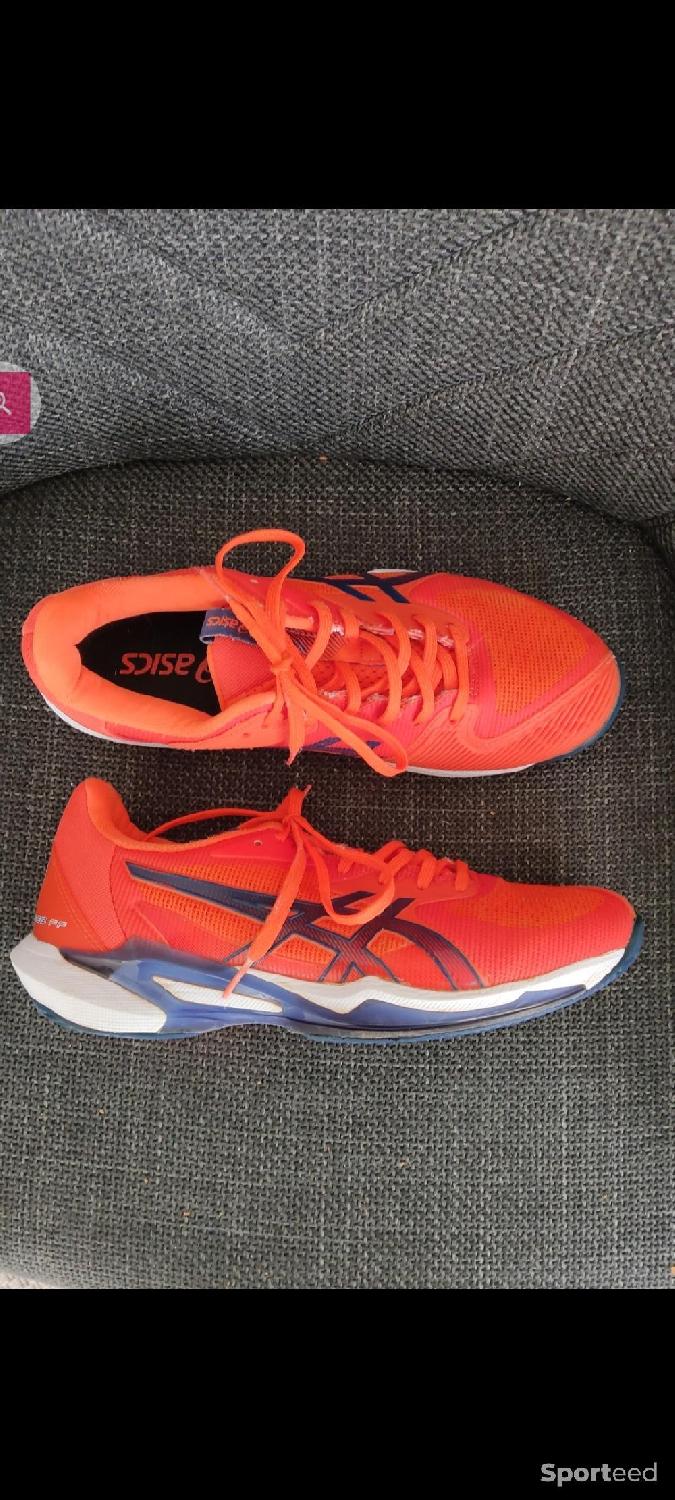 Chaussures tennis / padel haut de gamme Terre Battue Asics Solution Speed FF 3 Clay - Taille 40 - Orange et bleu Très bon état Asics reconditionné disponible sur Sporteed | Dero