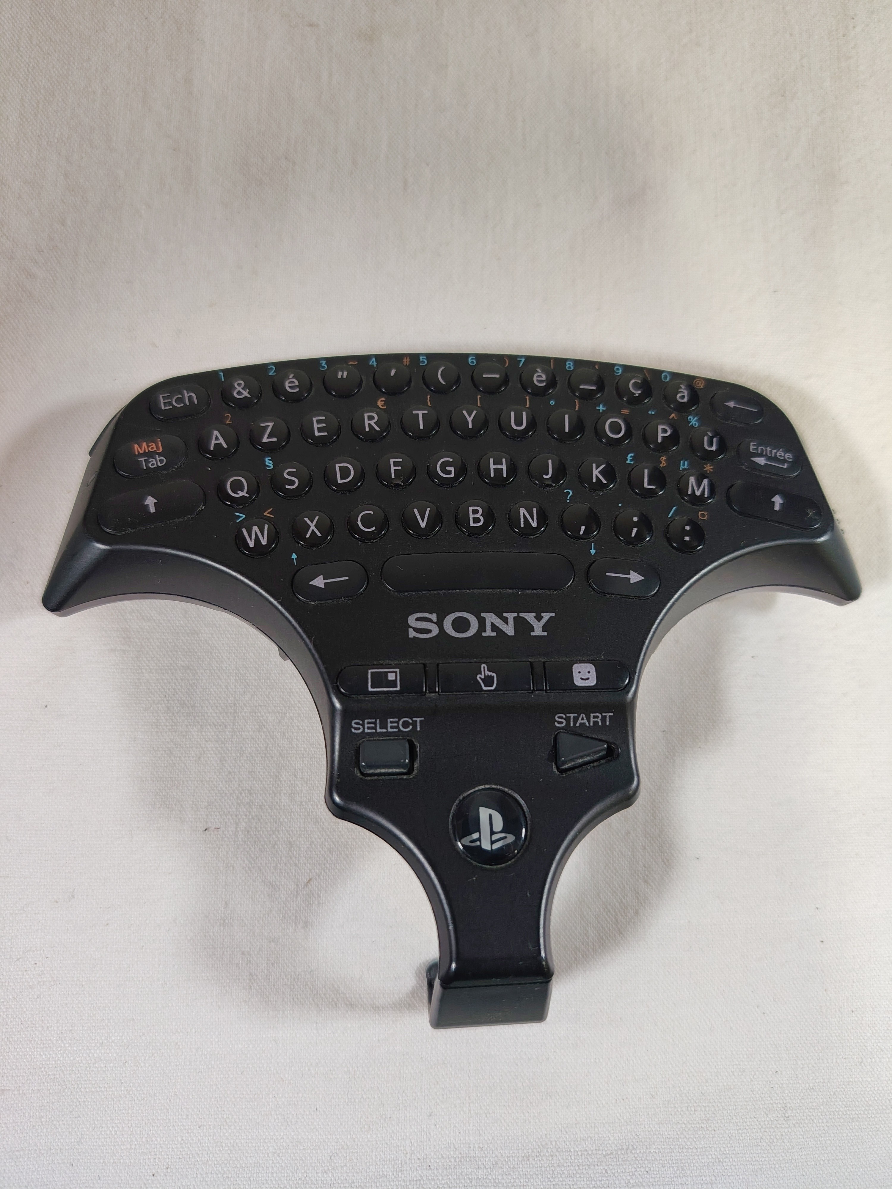 Voir photo 2 de Clavier sans fil pour manette Sony PS3 ( AZERTY ) Clavier sans fil pour manette Sony PS3 ( AZERTY ) Très bon état reconditionné photo 2
