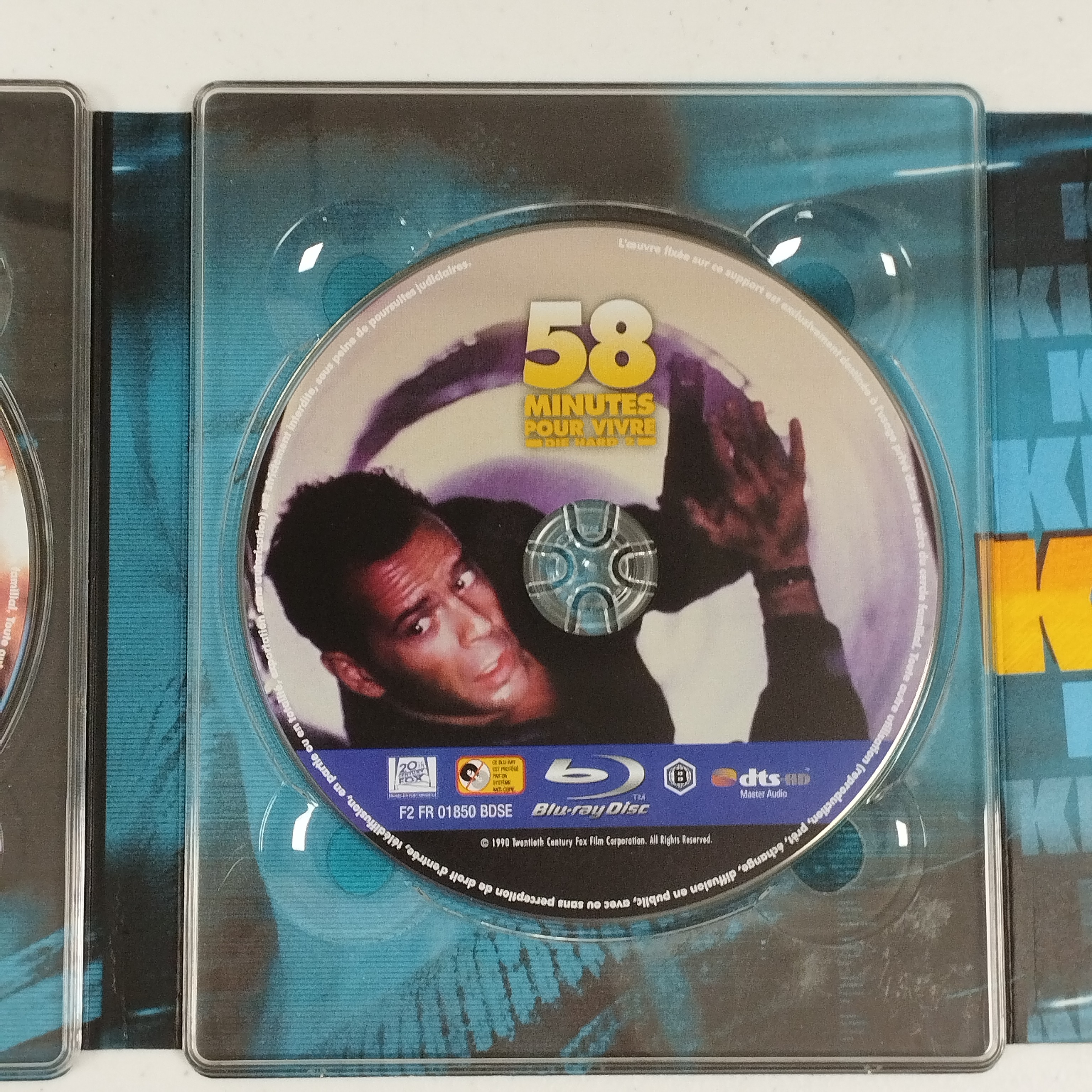 Voir photo 8 de Coffret blu-ray : Die Hard Quadrilogie Coffret blu-ray : Die Hard Quadrilogie Très bon état reconditionné photo 8