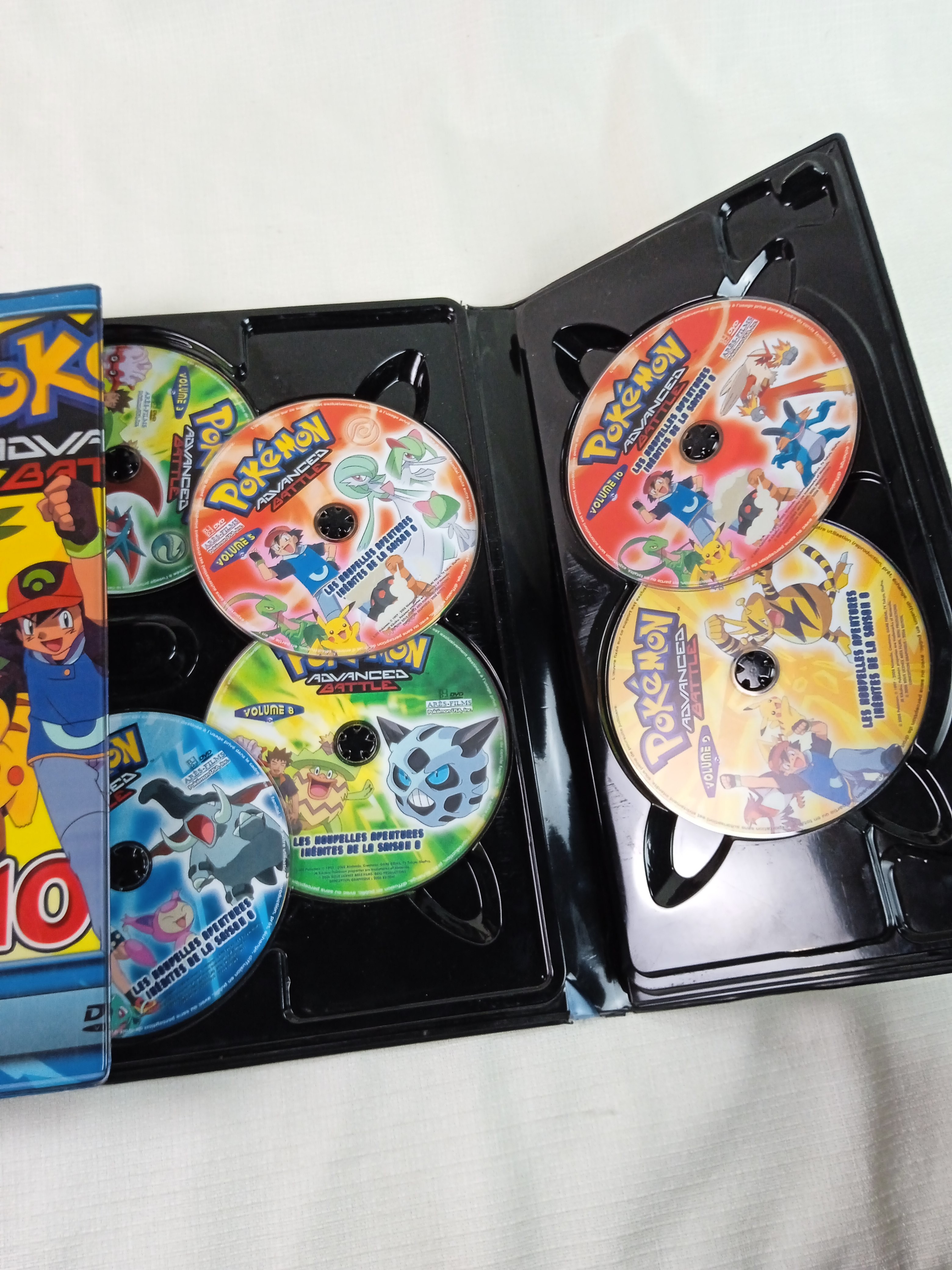 Voir photo 4 de Coffret POKEMON ADVANCED BATTLE, coffret collector 10 dvds Coffret POKEMON ADVANCED BATTLE, coffret collector 10 dvds Bon état reconditionné photo 4