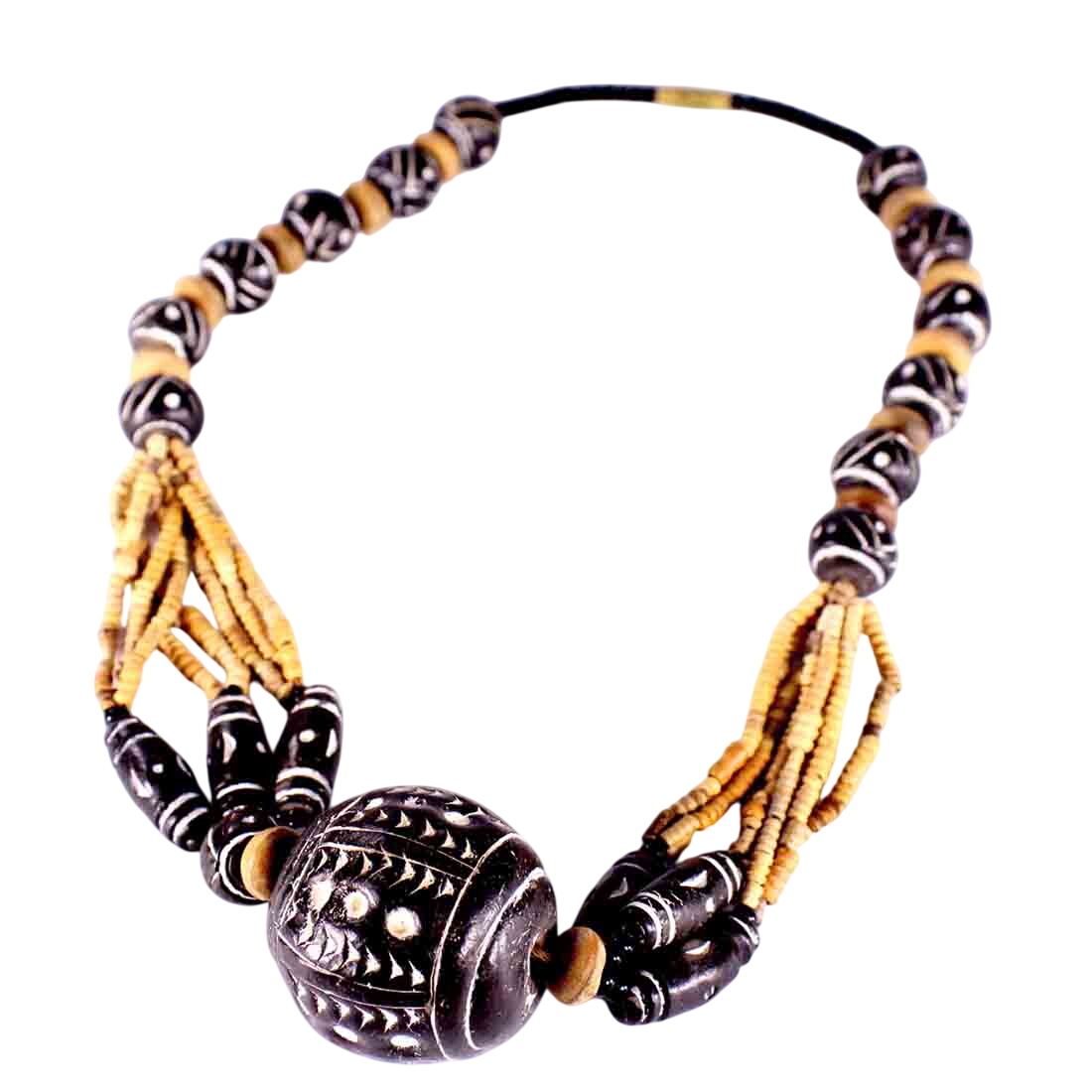 Collier ethnique terre cuite et bois Bon état - 15,00 € Collier ethnique terre cuite et bois Bon état reconditionné disponible sur Label Emmaüs