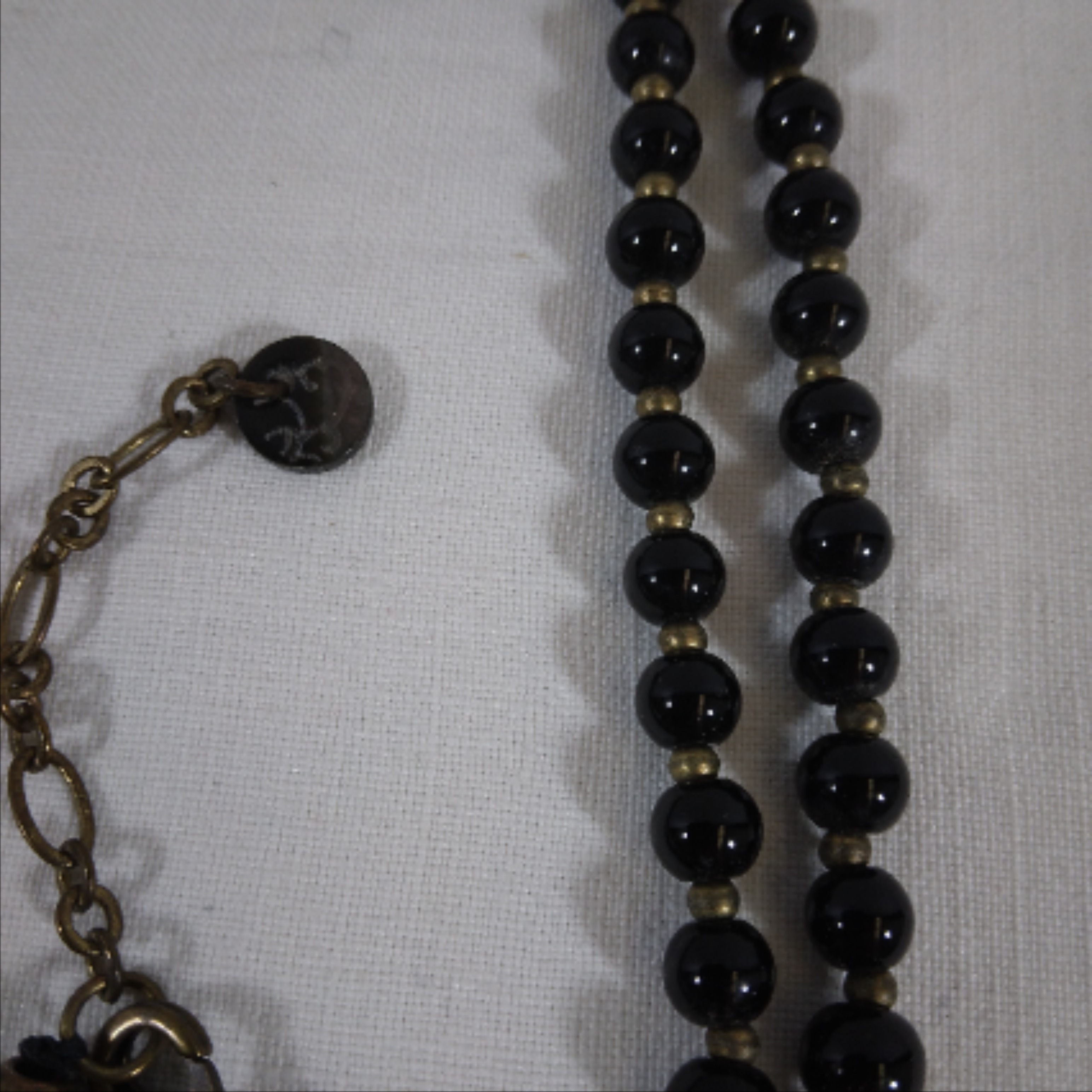 Voir photo 4 de Collier, Moon C Paris - cuivre, perle noire et œil du tigre Collier, Moon C Paris - cuivre, perle noire et œil du tigre Très bon état reconditionné photo 4