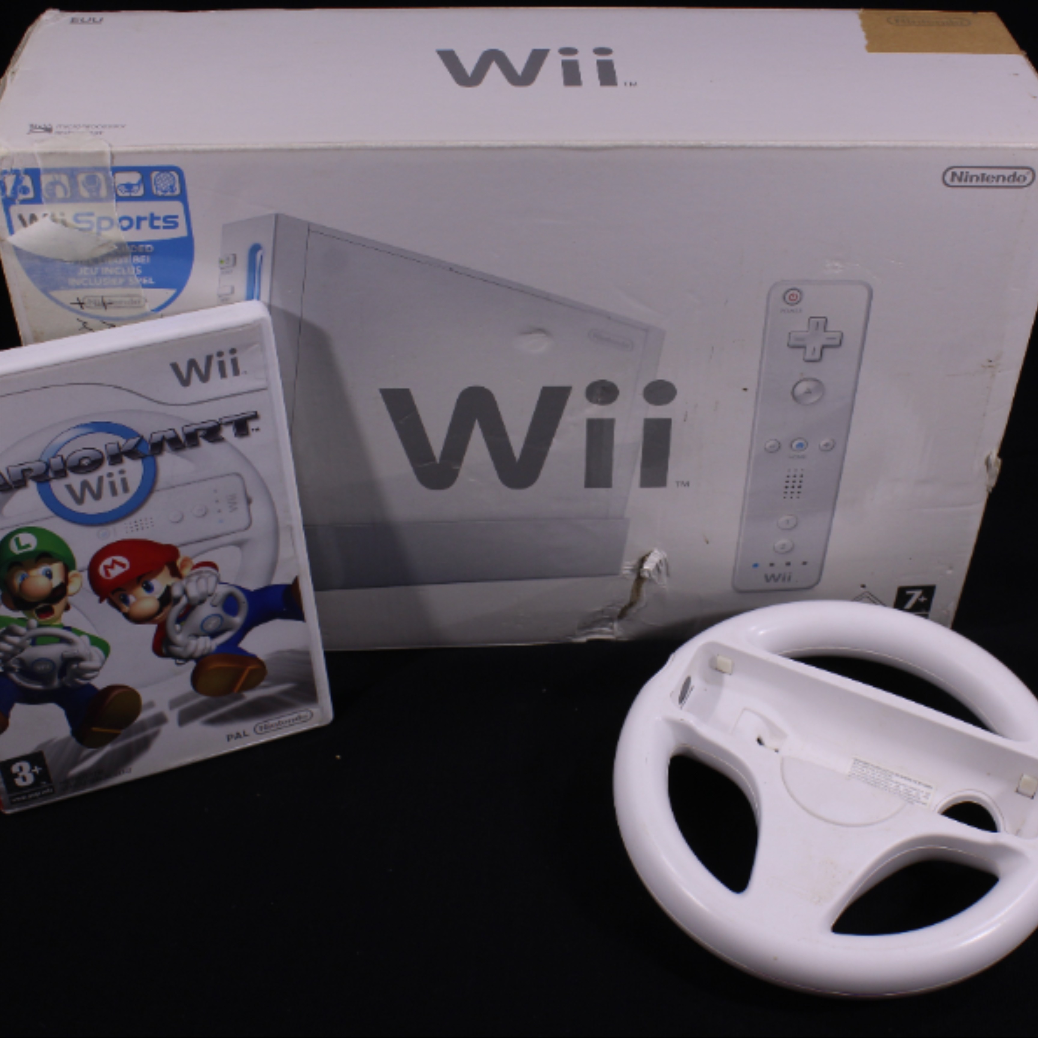 Voir photo 3 de Console WII + volant et jeu Mario Kart - Nintendo Console WII + volant et jeu Mario Kart - Nintendo Bon état reconditionné photo 3