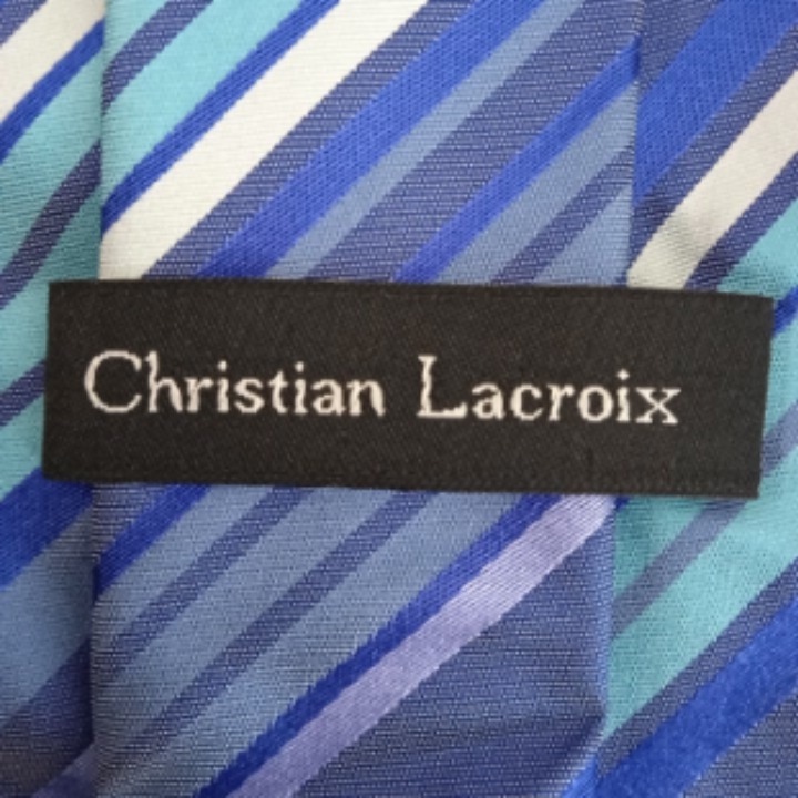 Voir photo 4 de Cravate en soie "CHRISTIAN LACROIX" Cravate en soie "CHRISTIAN LACROIX" Bon état reconditionné photo 4
