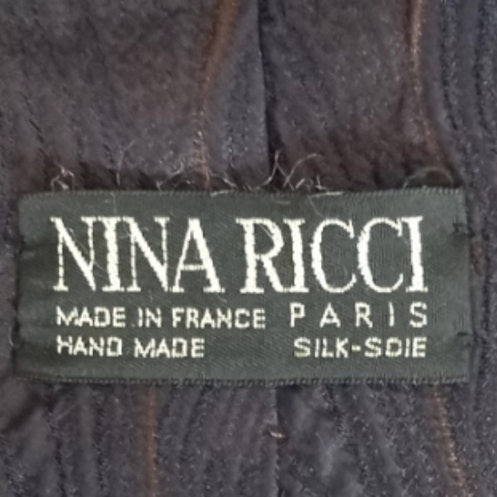 Voir photo 6 de Cravate en soie "NINA RICCI" Cravate en soie "NINA RICCI" État correct reconditionné photo 6