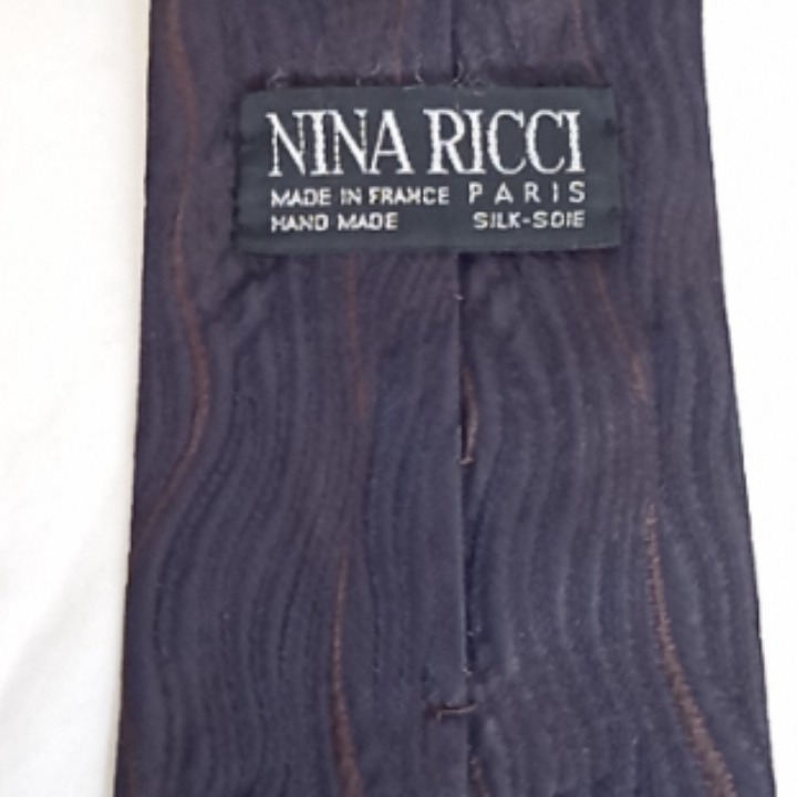Voir photo 8 de Cravate en soie "NINA RICCI" Cravate en soie "NINA RICCI" État correct reconditionné photo 8