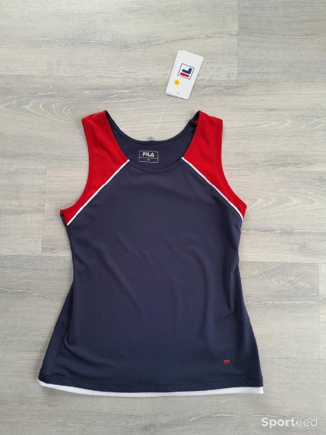 Débardeur running Comme neuf (c'est déjà la condition standard) Fila reconditionné disponible sur Sporteed