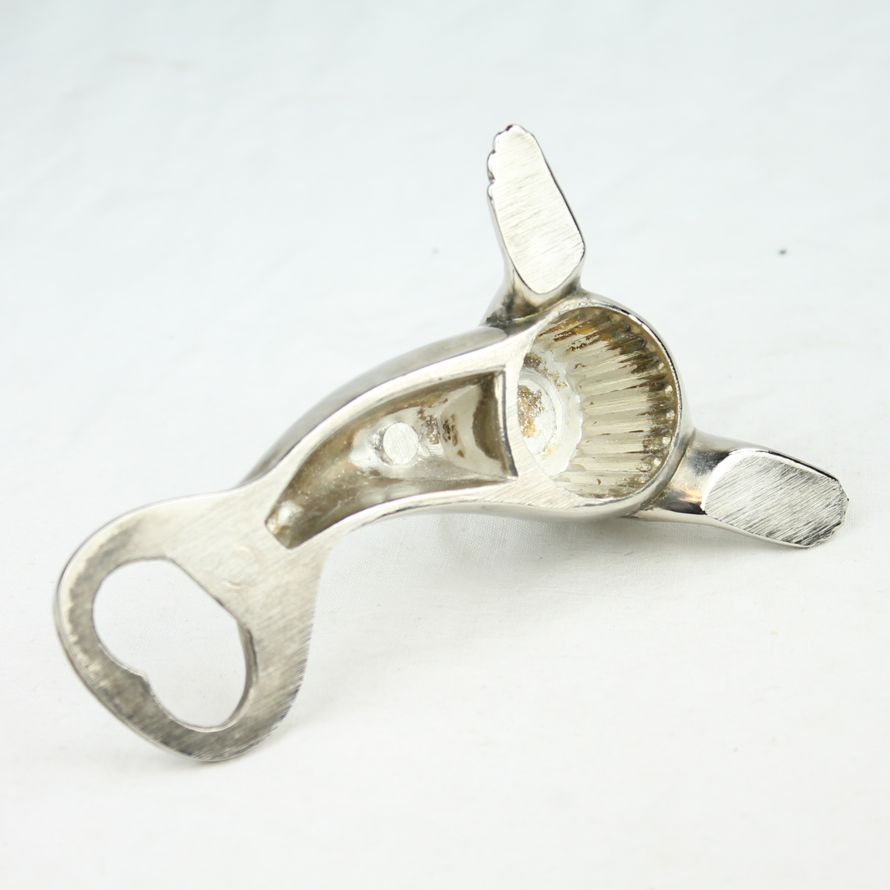 Voir photo 4 de Décapsuleur "Otarie" vintage - Zinc Décapsuleur "Otarie" vintage - Zinc reconditionné photo 4