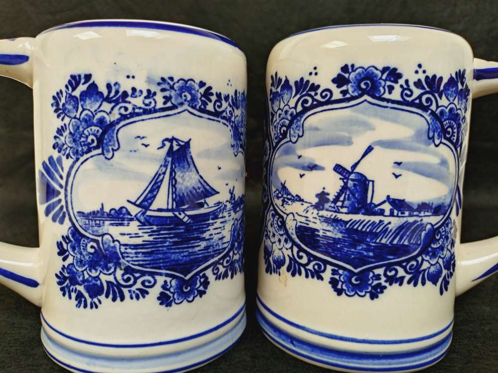 Voir photo 2 de Deux chopes à bière Delft Blue, moulin à vent et voilier, céramique. Deux chopes à bière Delft Blue, moulin à vent et voilier, céramique. Très bon état reconditionné photo 2