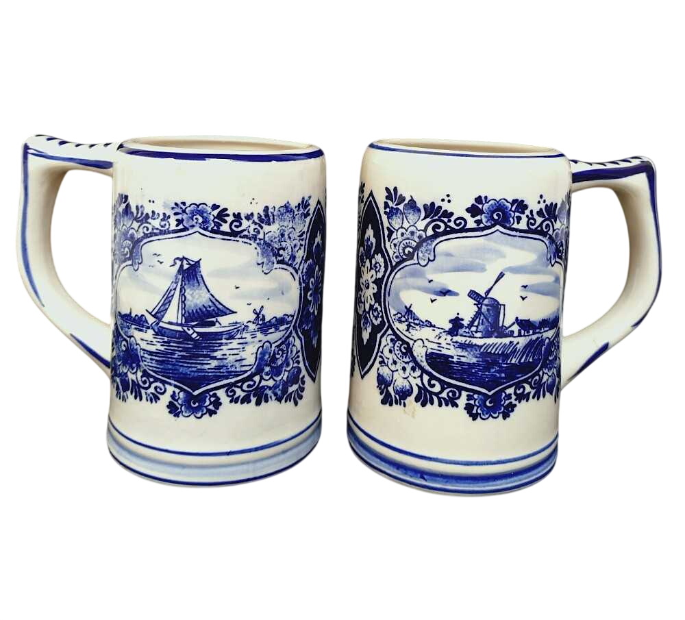 Deux chopes à bière Delft Blue, moulin à vent et voilier, céramique. Très bon état - 20,00 € Deux chopes à bière Delft Blue, moulin à vent et voilier, céramique. Très bon état reconditionné disponible sur Label Emmaüs