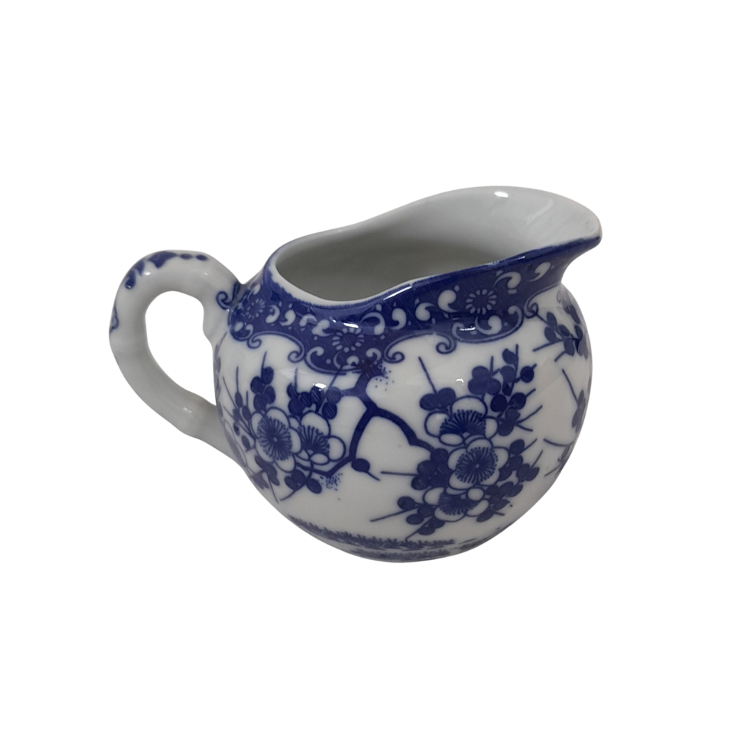 Voir photo 11 de Élégant Service à Thé Vintage en Porcelaine Fine du Japon – Motif Fleuri Bleu et Blanc Élégant Service à Thé Vintage en Porcelaine Fine du Japon – Motif Fleuri Bleu et Blanc Très bon état reconditionné photo 11
