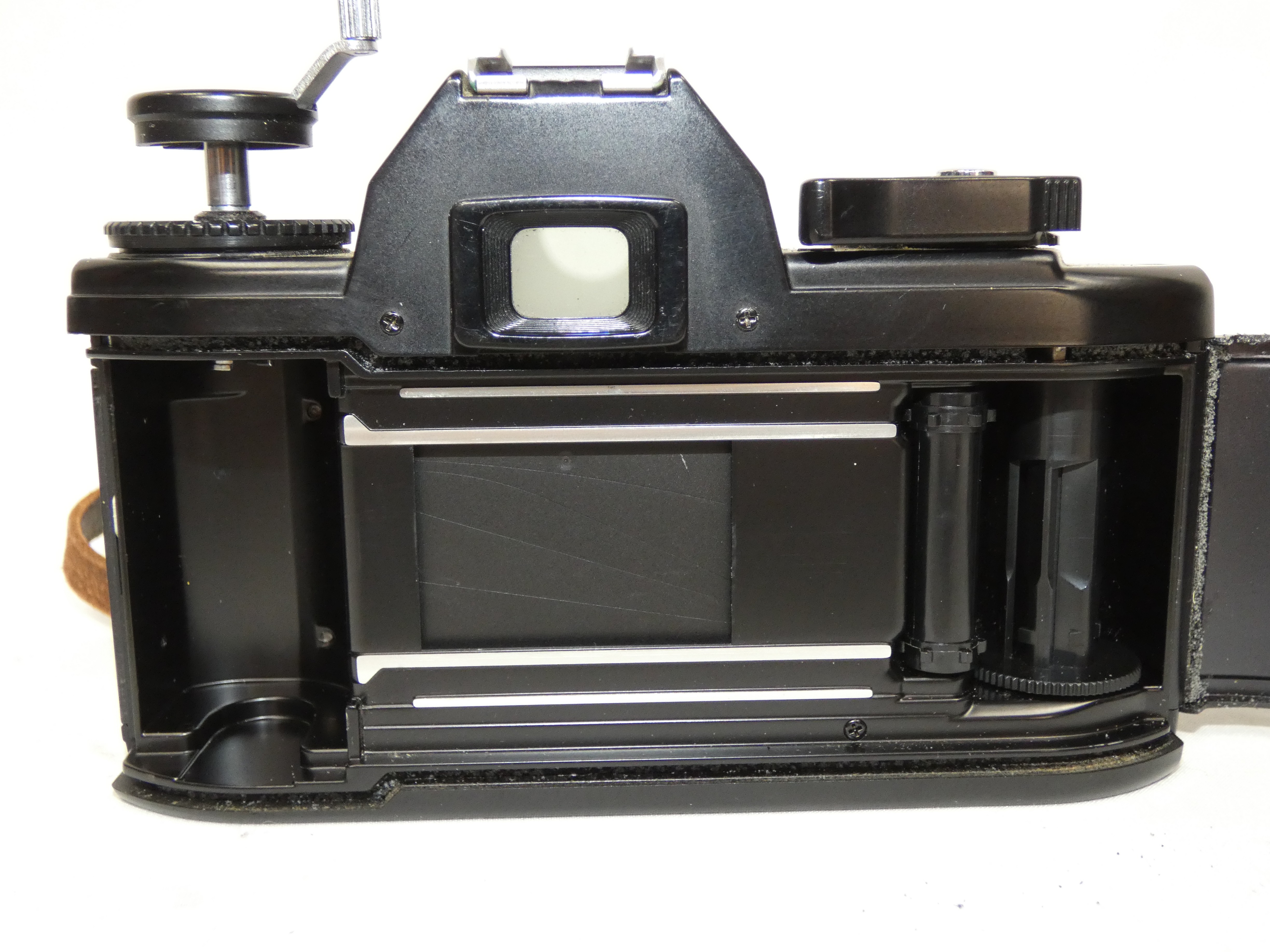 Voir photo 7 de Ensemble appareil photo argentique NIKON EM avec 2 objectifs 28 mm 1:2.8 et 50 mm 1:1.8 et un flash Hanimex tx30 (Non testé) Ensemble appareil photo argentique NIKON EM avec 2 objectifs 28 mm 1:2.8 et 50 mm 1:1.8 et un flash Hanimex tx30 (Non testé) Très bon état reconditionné photo 7