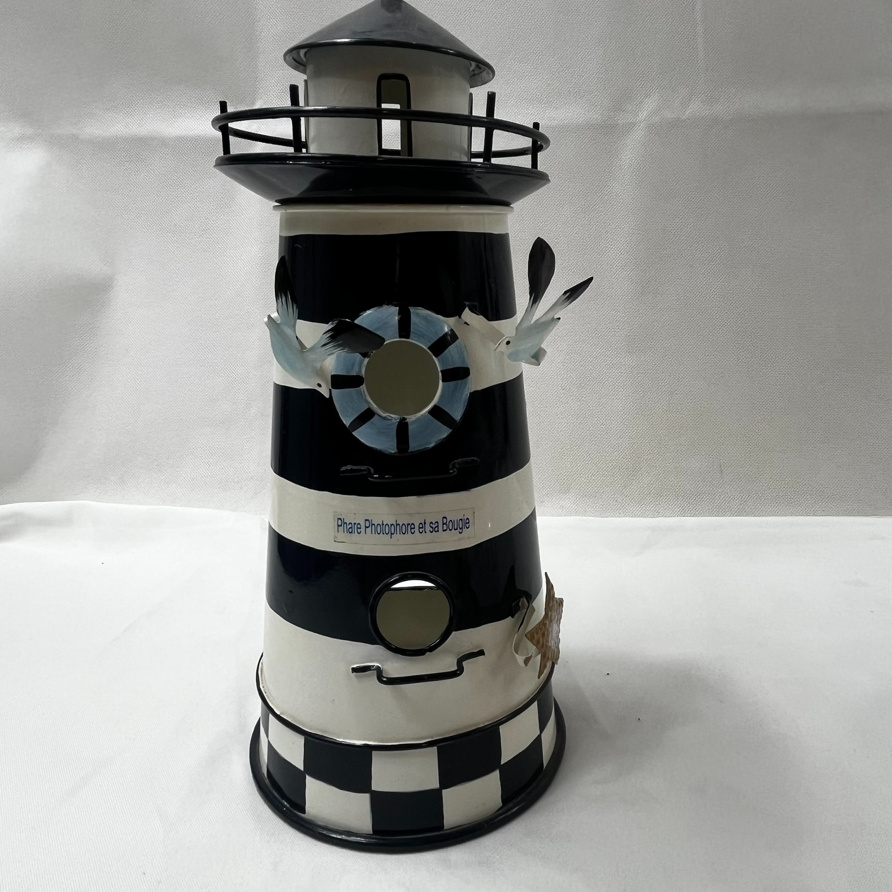 Voir photo 4 de Ensemble de décoration marine . Un photophore phare , un vase carpe et 3 coquillages Ensemble de décoration marine . Un photophore phare , un vase carpe et 3 coquillages Très bon état reconditionné photo 4