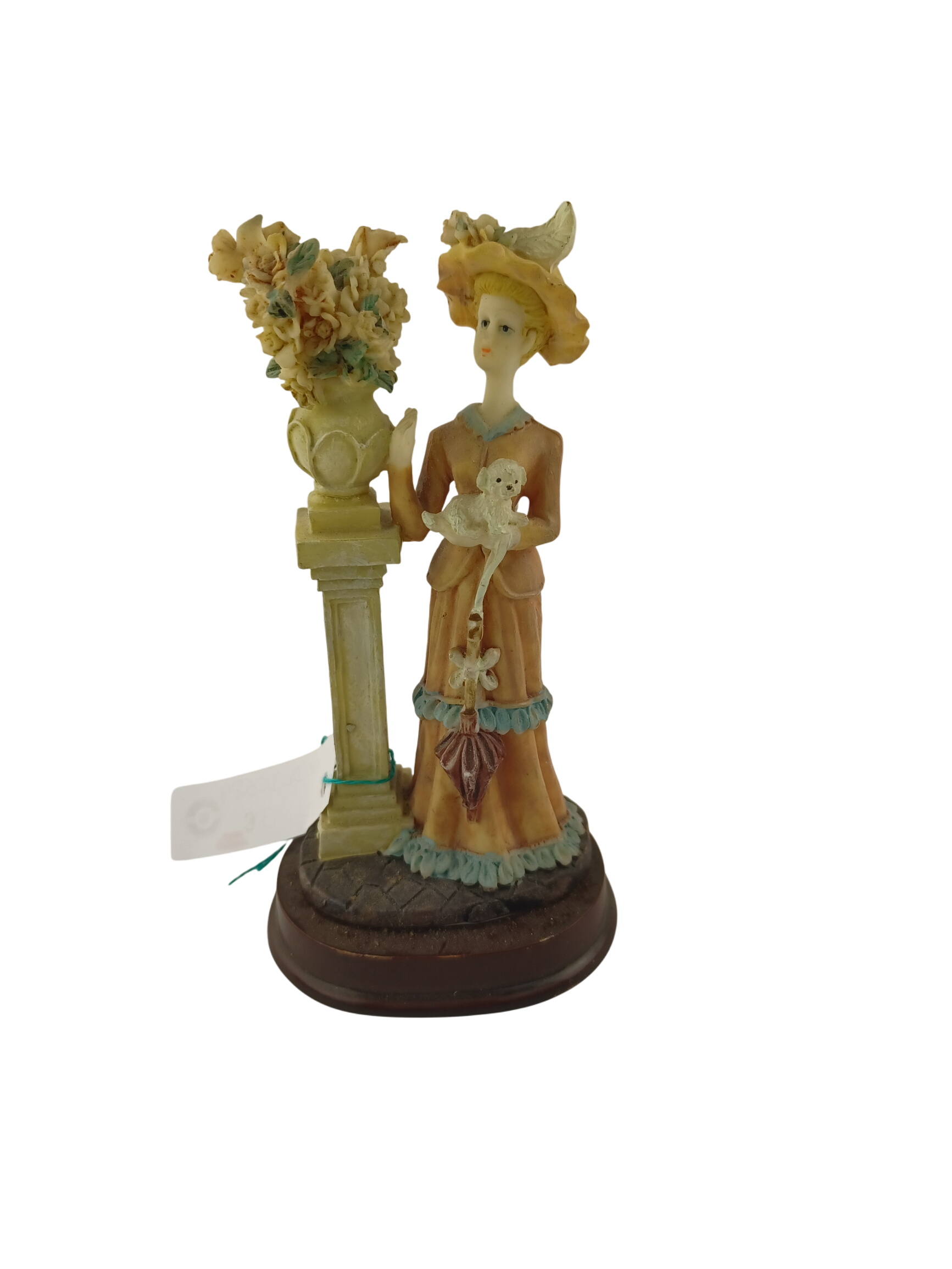 Figurine en résine de 14cm d'une noble à grand chapeau tenant un chiot dans ses bras à côté d'une colonne avec un vase de fleurs roses et bleues sur socle Très bon état - 13,00 € Figurine en résine de 14cm d'une noble à grand chapeau tenant un chiot dans ses bras à côté d'une colonne avec un vase de fleurs roses et bleues sur socle Très bon état reconditionné disponible sur Label Emmaüs