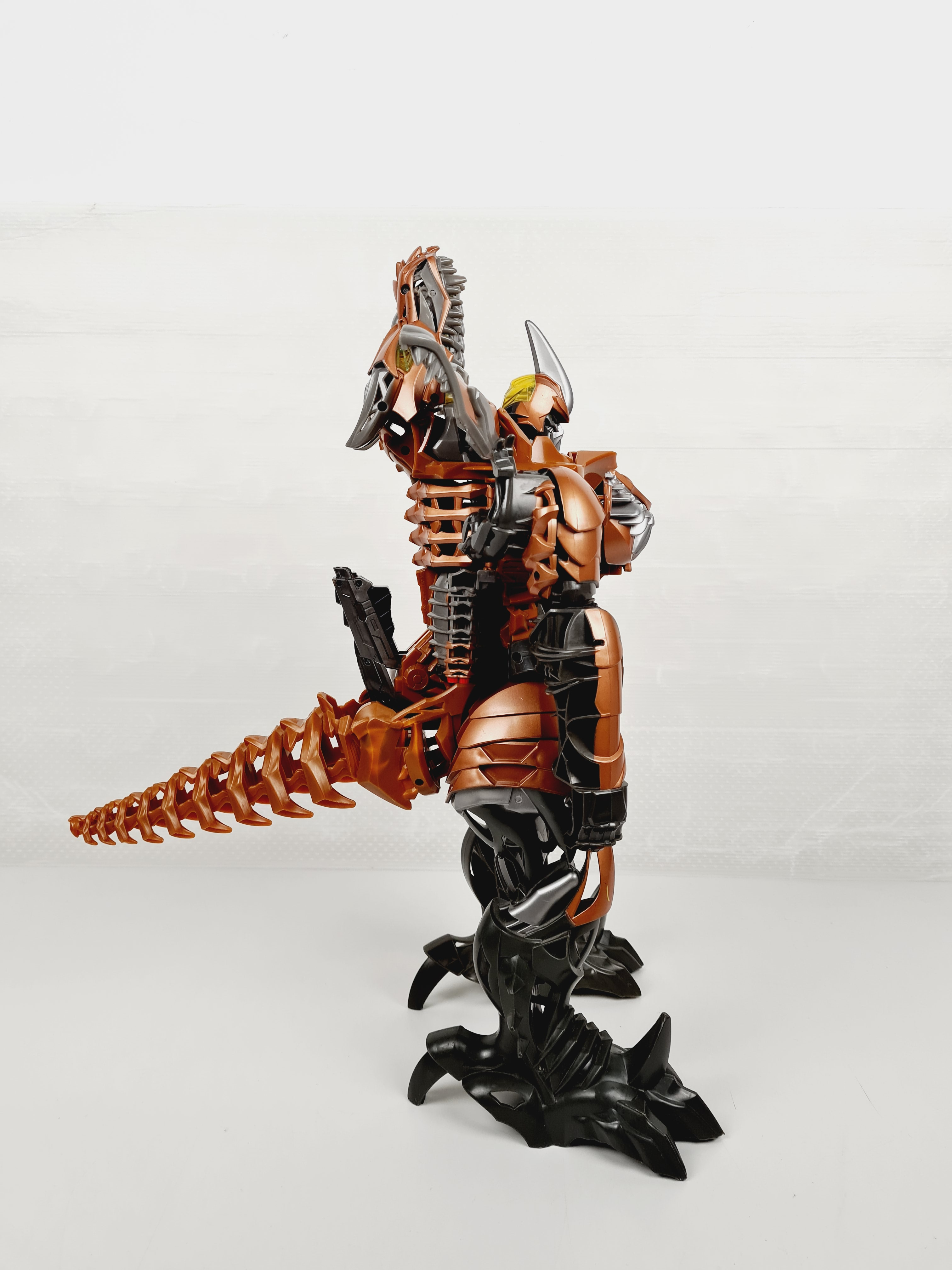Voir photo 2 de Figurine - Transformers dinosaure Grimlock - 50 cm Figurine - Transformers dinosaure Grimlock - 50 cm Bon état reconditionné photo 2