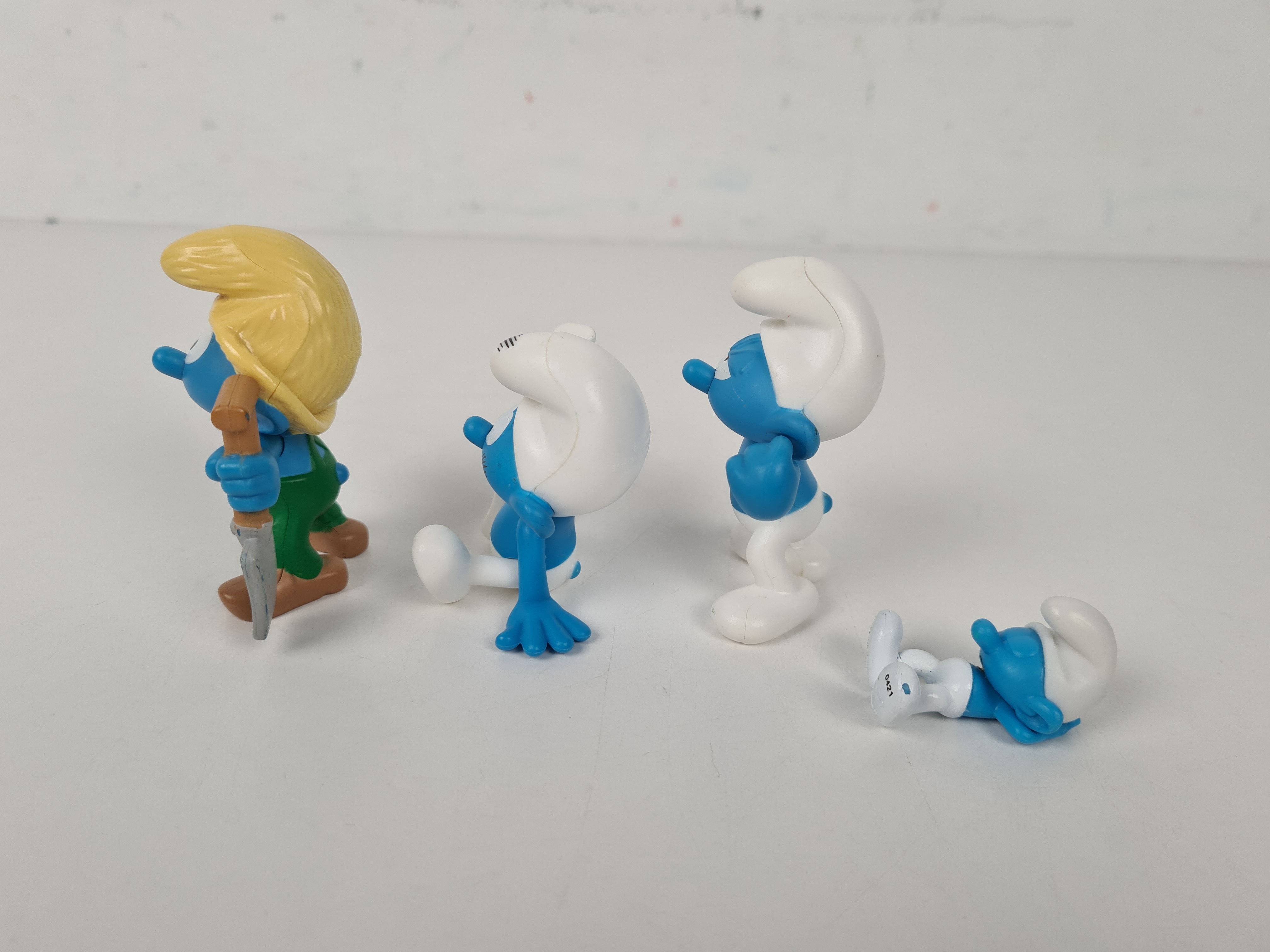 Voir photo 2 de Figurines - Lot de 4 Figurines Stroumpf - Schtroumpfs Figurines - Lot de 4 Figurines Stroumpf - Schtroumpfs Bon état reconditionné photo 2