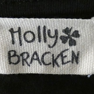 Voir photo 4 de Gilet noir imprimé - Femme - Molly Bracken - Taille unique Gilet noir imprimé - Femme - Molly Bracken - Taille unique Bon état reconditionné photo 4