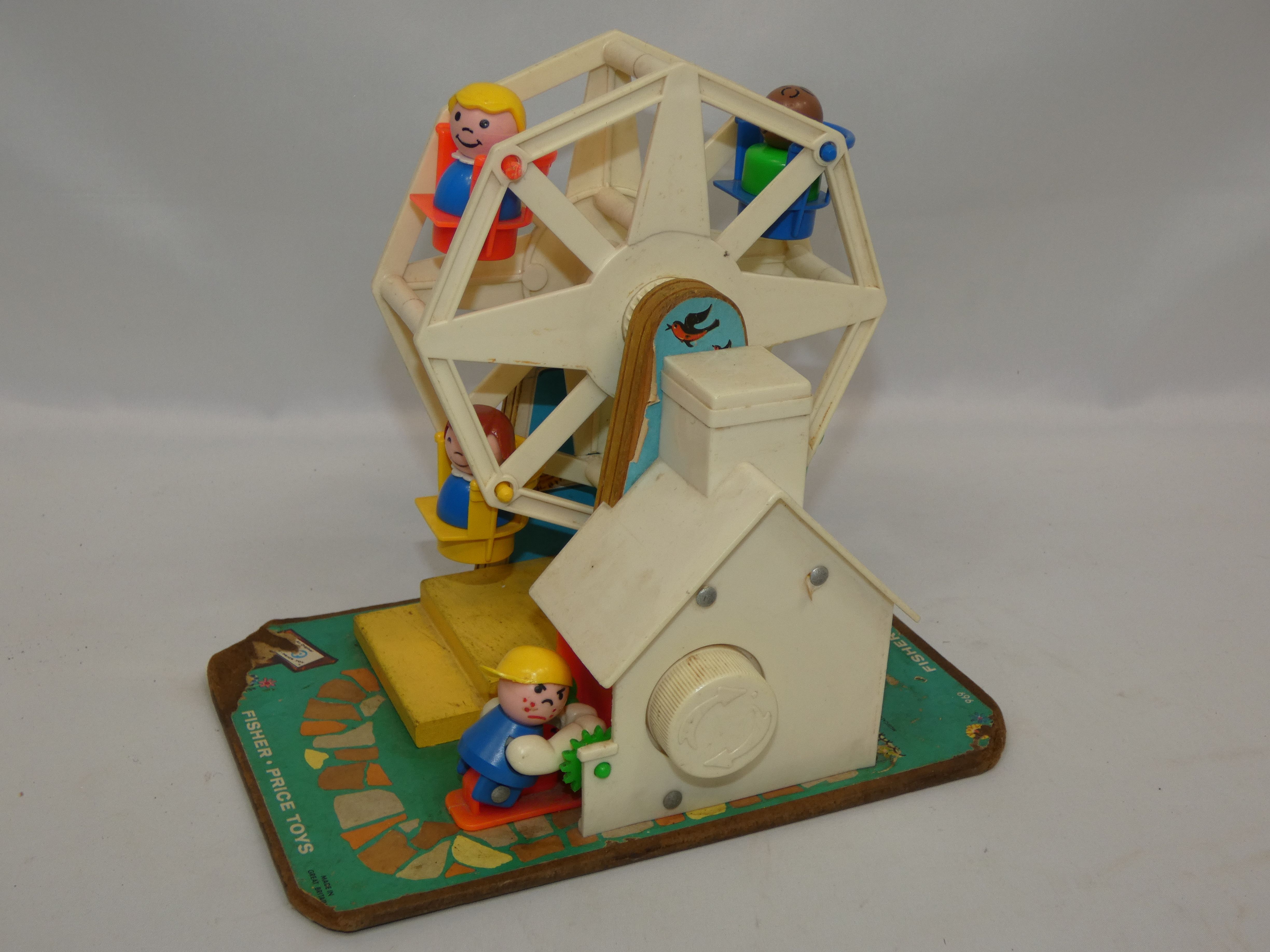 Voir photo 3 de Grande roue musicale FISHER PRICE 1966 Grande roue musicale FISHER PRICE 1966 État correct reconditionné photo 3