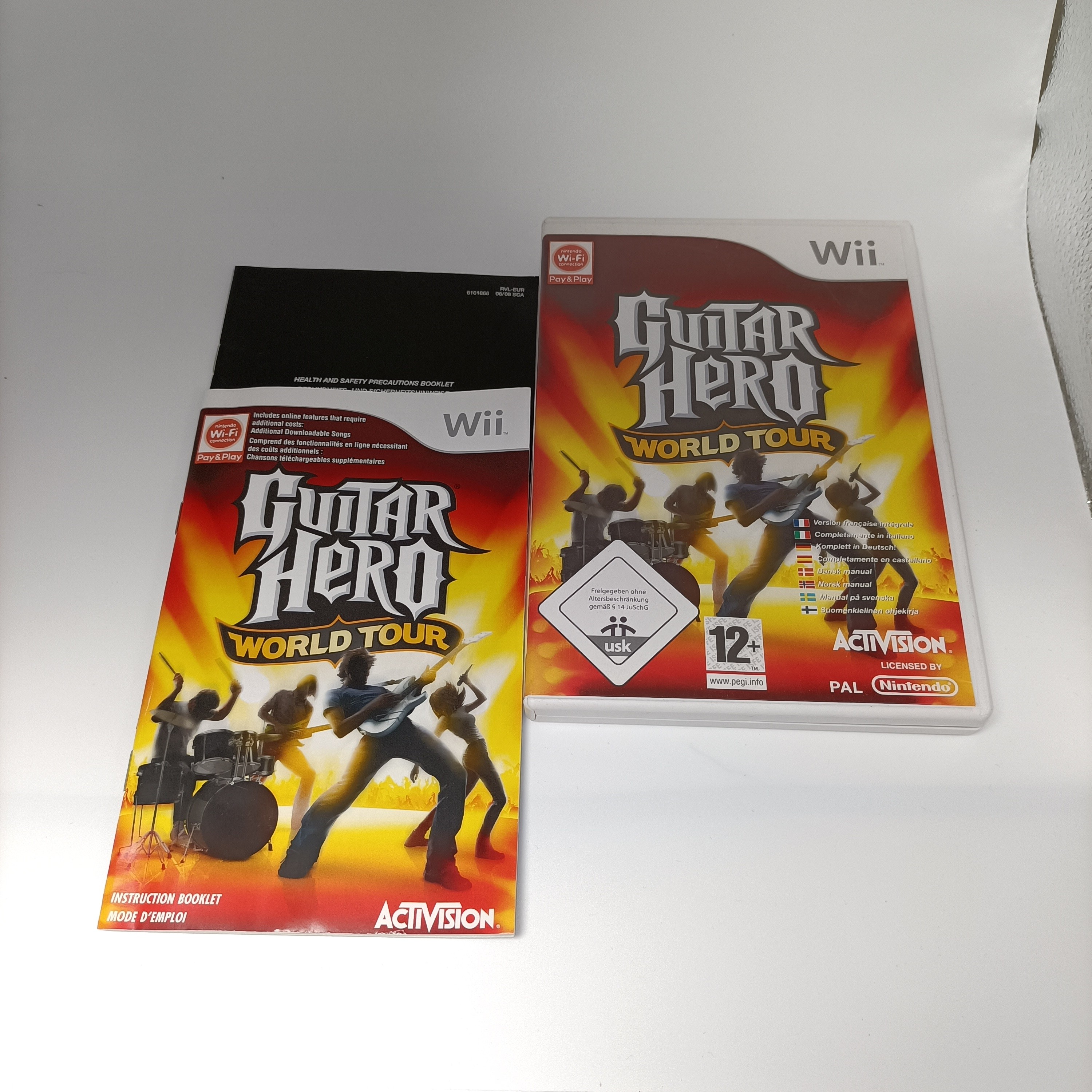Voir photo 4 de Guitar Hero World Tour Wii complet avec notice jeu testé compatible Wii U Guitar Hero World Tour Wii complet avec notice jeu testé compatible Wii U Très bon état reconditionné photo 4