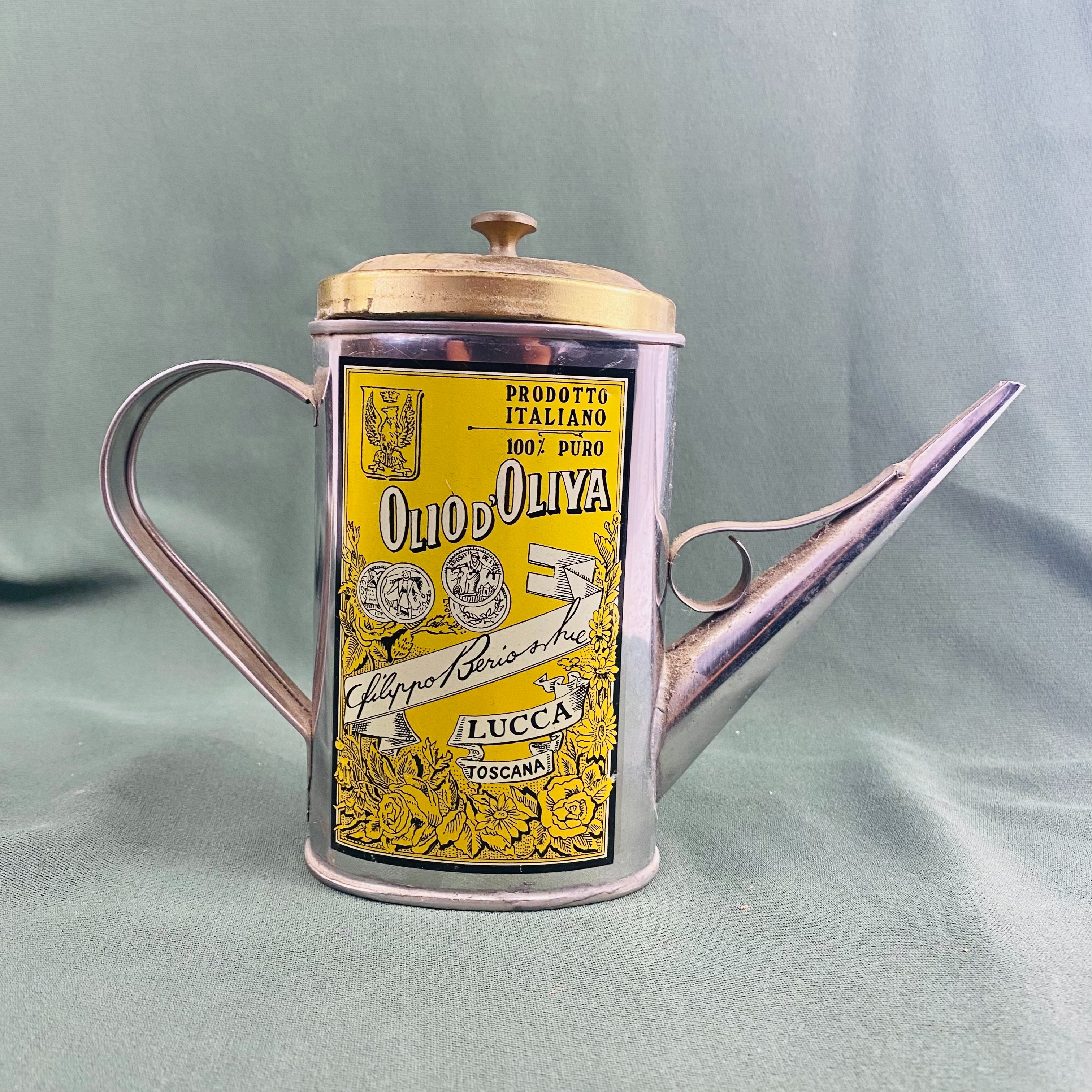 Voir photo 2 de Huilière Vintage Filippo Berio/Pot à huile Inox&Laiton style Italien Huilière Vintage Filippo Berio/Pot à huile Inox&Laiton style Italien Bon état reconditionné photo 2