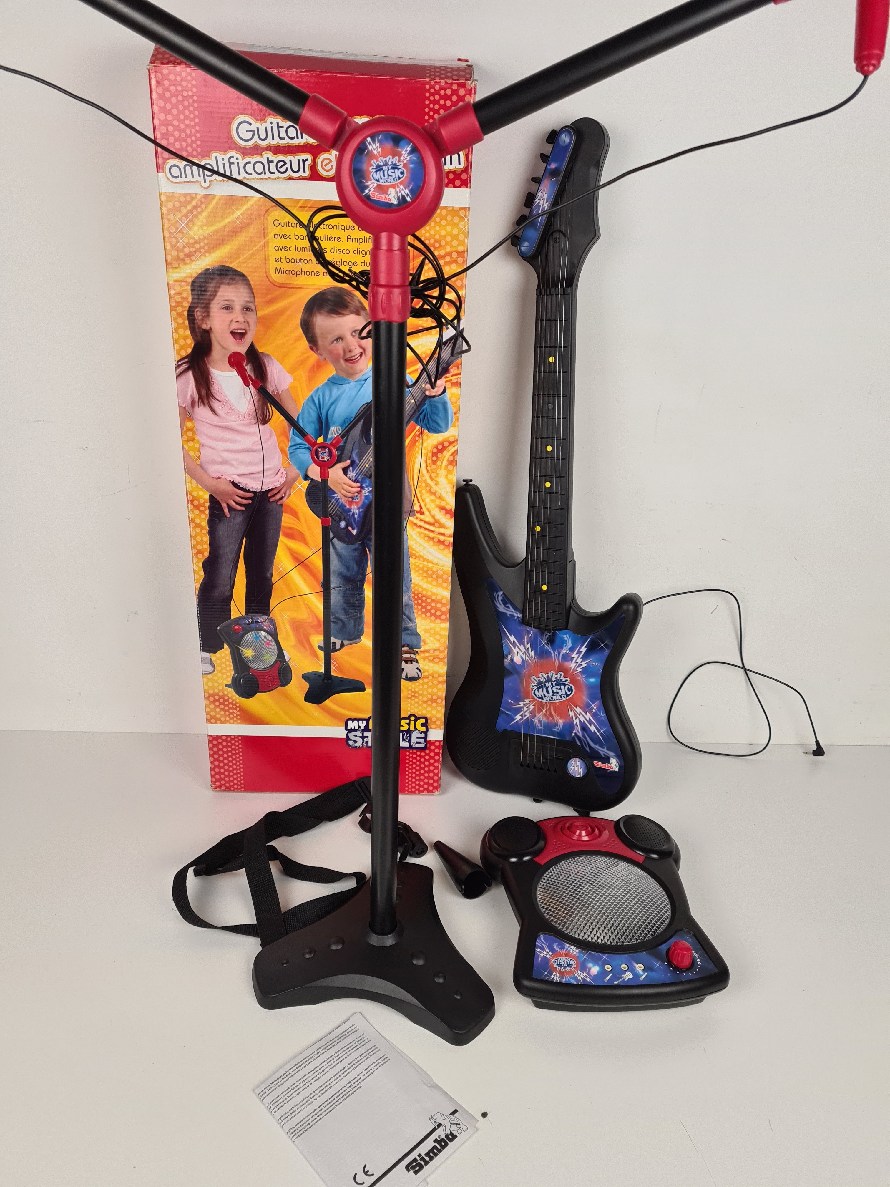 Voir photo 4 de Instrument de musique - My music style - Guitare avec amplificateur et micro twin Instrument de musique - My music style - Guitare avec amplificateur et micro twin Très bon état reconditionné photo 4